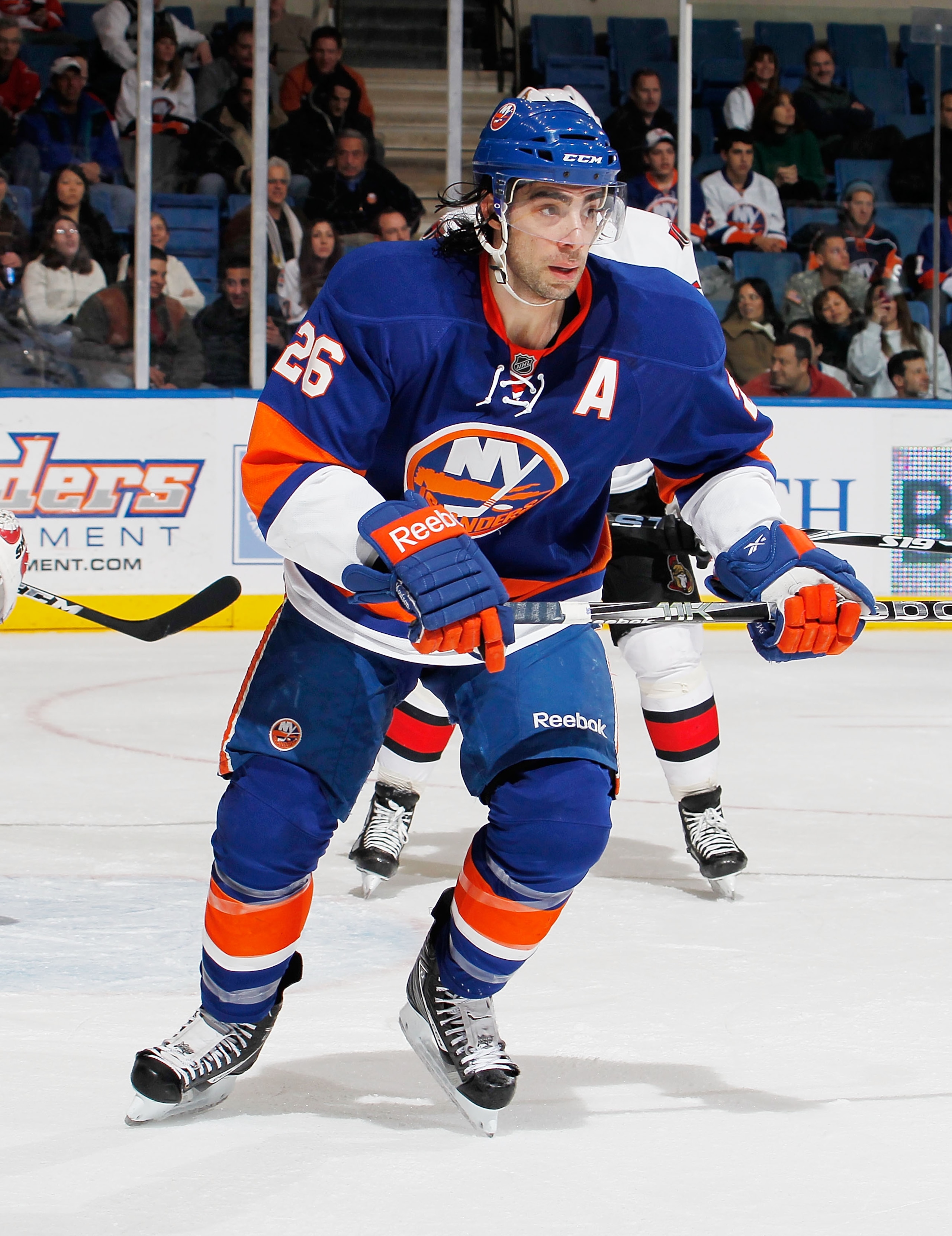 UNIONDALE, NY - JANUARY 13:  Matt Moulson #26 of the New York Islanders skates during an NHL hockey game against the Ottawa Senators at the Nassau Coliseum on January 13, 2011 in Uniondale, New York.  (Photo by Paul Bereswill/Getty Images)