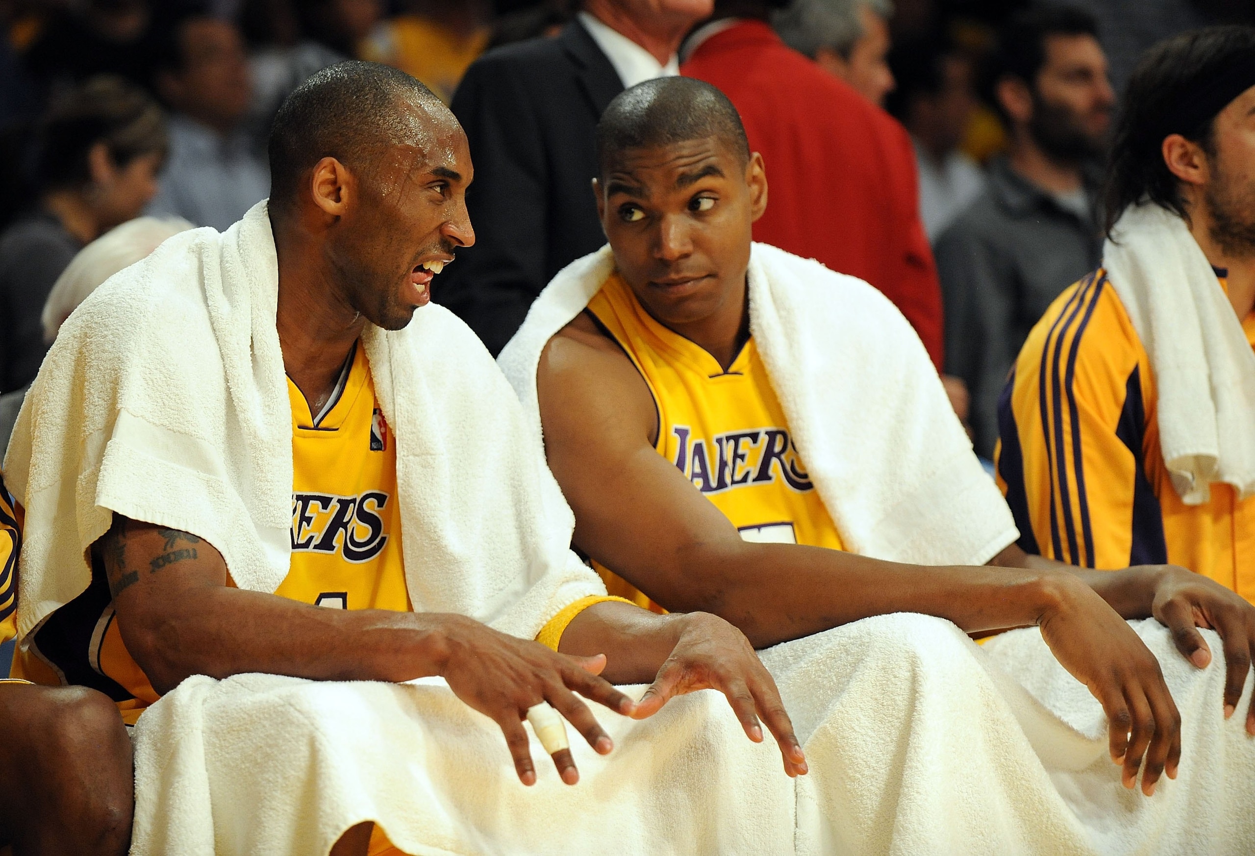 LOS ANGELES, CA - MAY 06:  (L-R) Kobe Bryant #24 of the Los Angeles Lakers talks with Andrew Bynum #17 on the bench against the Houston Rockets in Game Two of the Western Conference Semifinals during the 2009 NBA Playoffs at Staples Center on May 6, 2009
