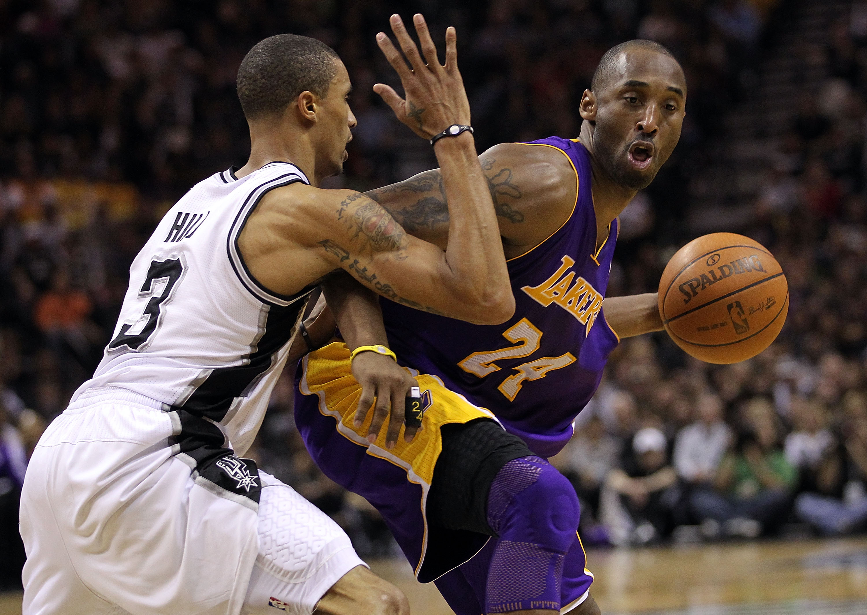 SAN ANTONIO, TX - DECEMBER 28:  Guard Kobe Bryant #24 of the Los Angeles Lakers dribbles the ball against George Hill #3 of the San Antonio Spurs at AT&T Center on December 28, 2010 in San Antonio, Texas.  NOTE TO USER: User expressly acknowledges and agr