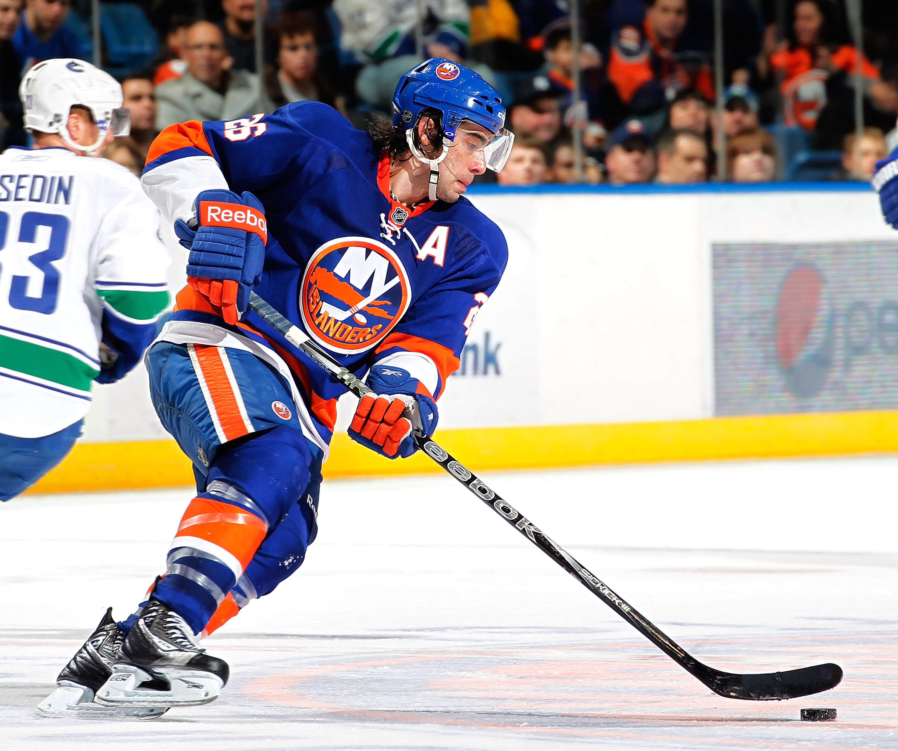 UNIONDALE, NY - JANUARY 11:  Matt Moulson #26 of the New York Islanders skates during an NHL game against the Vancouver Canucks at the Nassau Coliseum on January 11, 2011 in Uniondale, New York.  (Photo by Paul Bereswill/Getty Images)