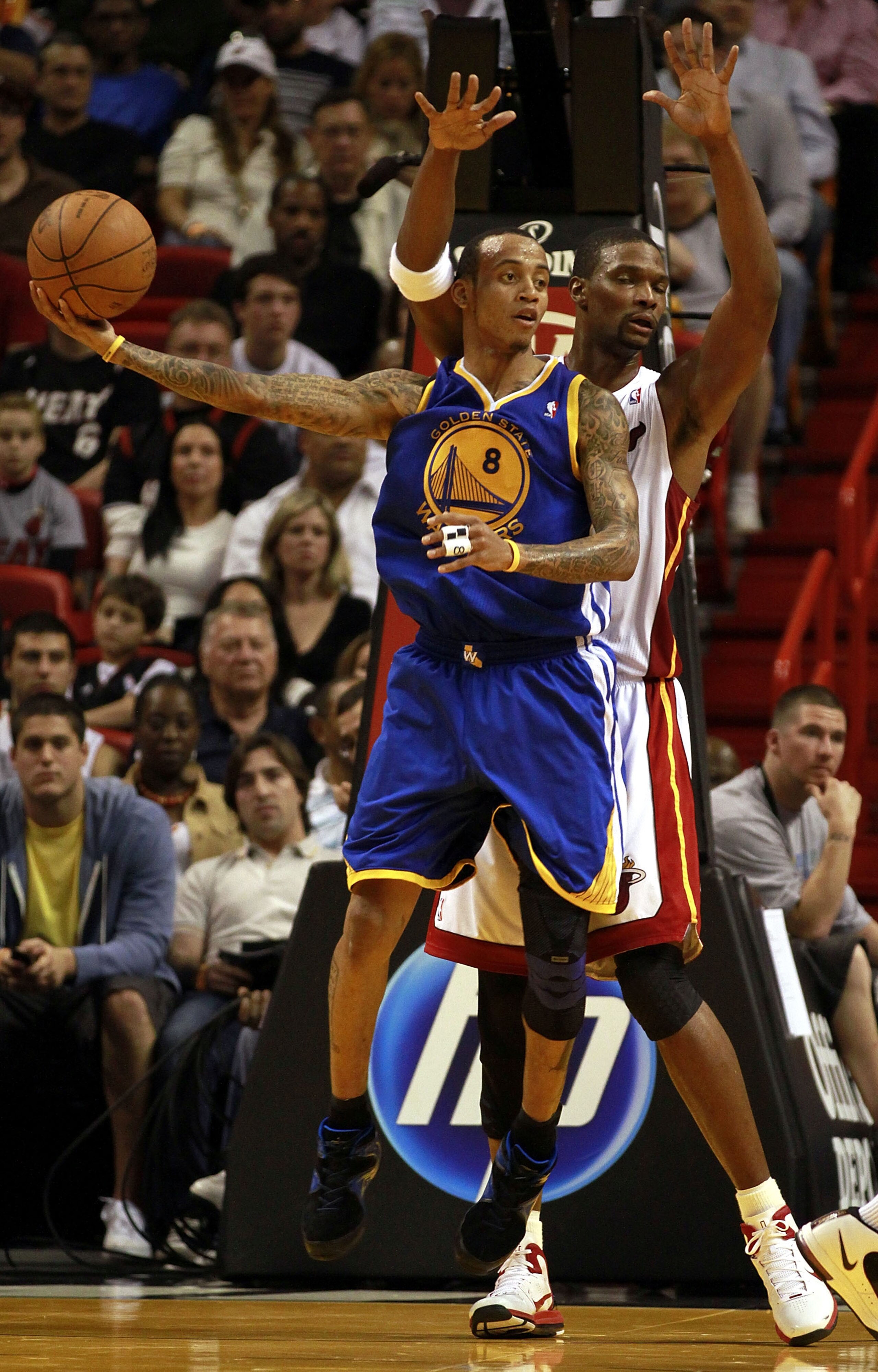 MIAMI - JANUARY 01: Monta Ellis # 8 of the Golden State Warriors protects the ball during a game against the Miami Heat at American Airlines Arena on January 1, 2011 in Miami, Florida. The Heat won 114-107. NOTE TO USER: User expressly acknowledges and ag
