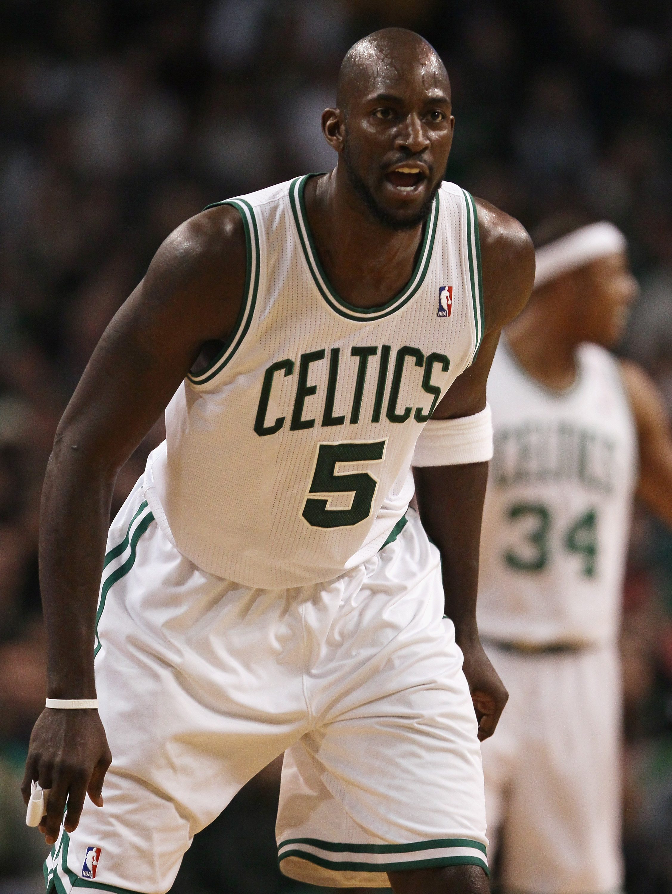 BOSTON, MA - JANUARY 17:  Kevin Garnett #5 of the Boston Celitcs makes a start in the game against the Orlando Magic on January 17, 2011 at the TD Garden in Boston, Massachusetts. Garnett missed several weeks due to a knee injury. NOTE TO USER: User expre