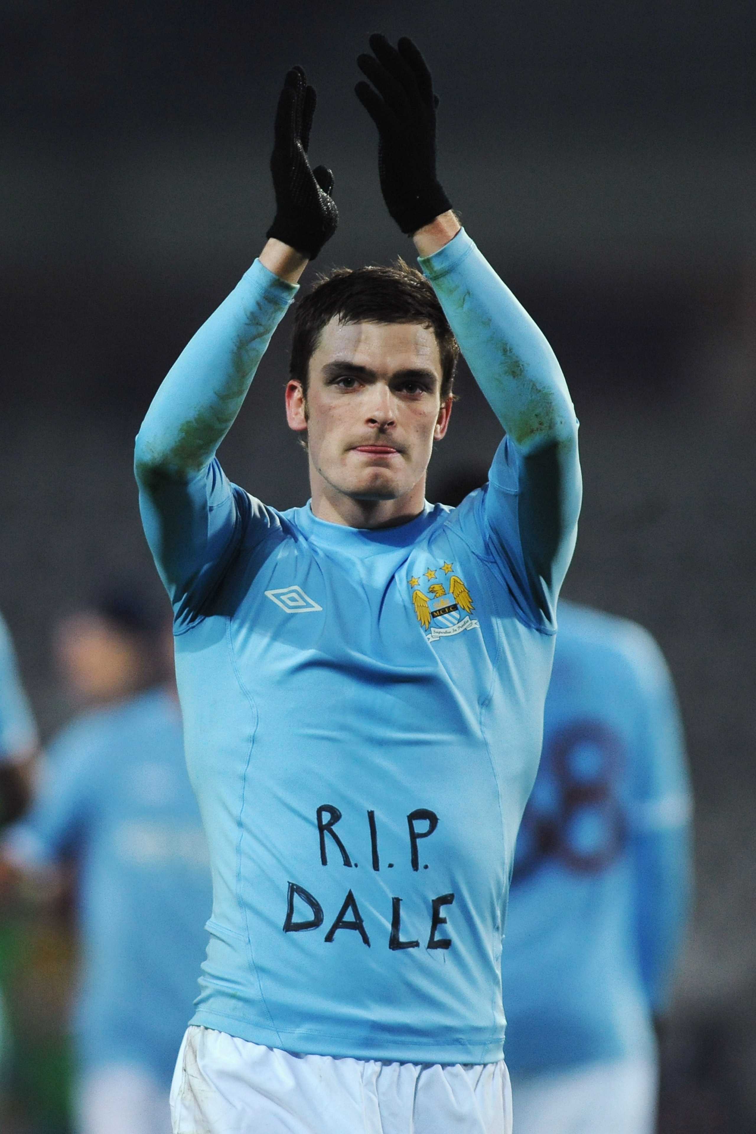 TURIN, ITALY - DECEMBER 16:  Adam Johnson of Manchester City salutes the crowd at the end of the UEFA Europa League group A match between Juventus FC and Manchester City at Stadio Olimpico di Torino on December 16, 2010 in Turin, Italy.  (Photo by Valerio