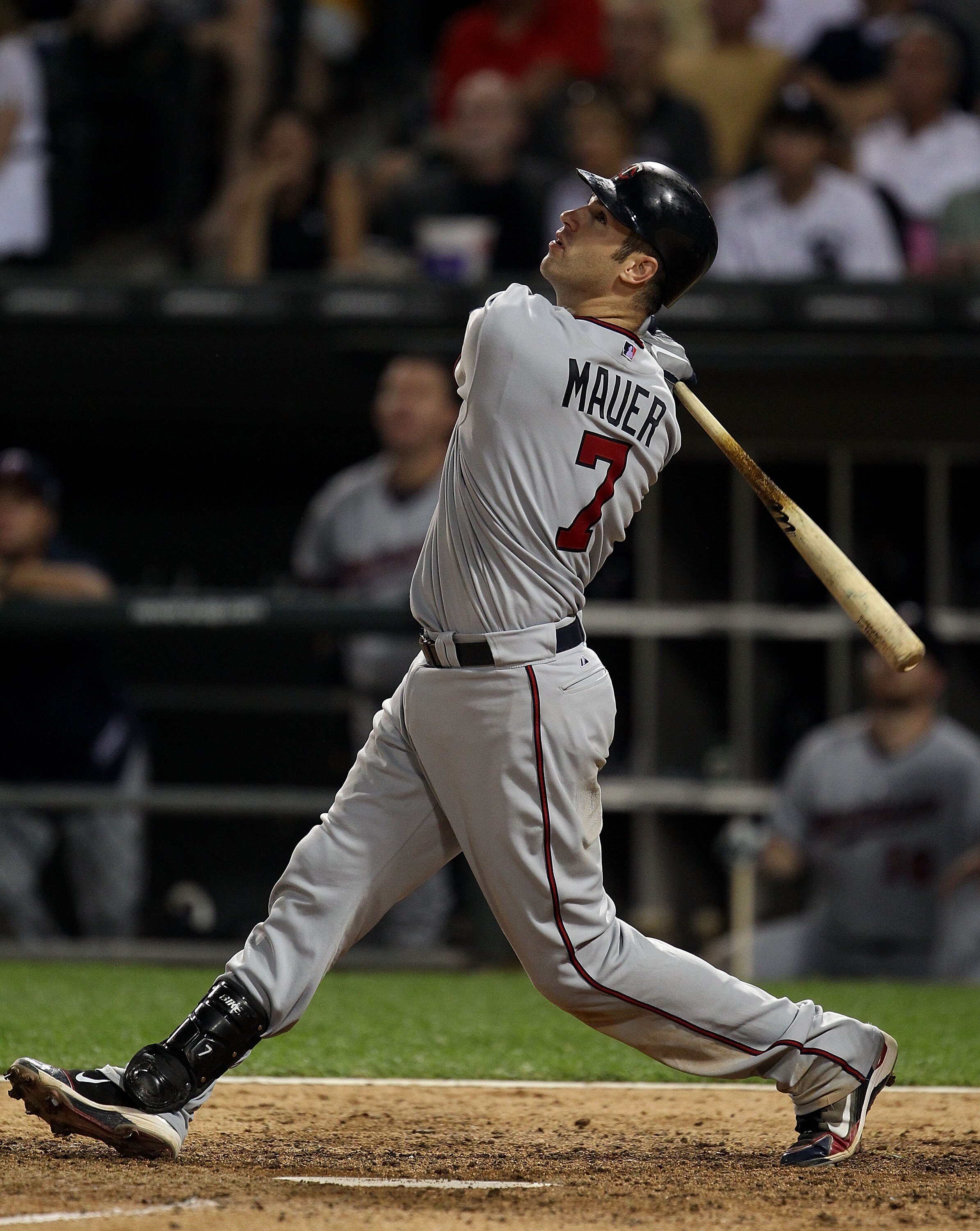 CHICAGO - AUGUST 10: Joe Mauer #7 of the Minnesota Twins takes a swing against the Chicago White Sox at U.S. Cellular Field on August 10, 2010 in Chicago, Illinois. The Twins defeated the White Sox 12-6. (Photo by Jonathan Daniel/Getty Images)