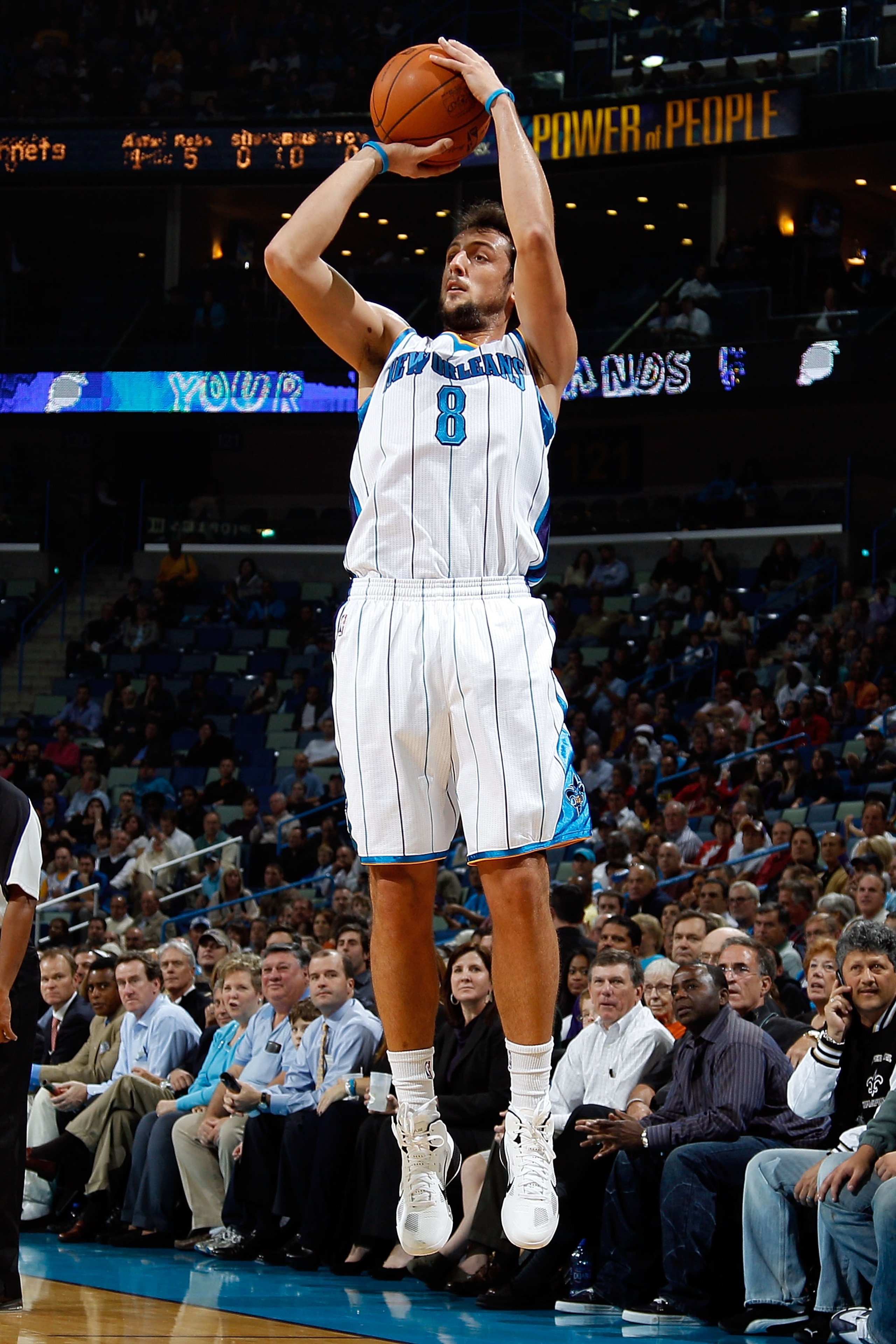 NEW ORLEANS - NOVEMBER 17: Marco Belinelli #8 of the New Orleans Hornets shoots the ball during the game against the Dallas Mavericks at the New Orleans Arena on November 17, 2010 in New Orleans, Louisiana. NOTE TO USER: User expressly acknowledges and NEW ORLEANS - NOVEMBER 17: Marco Belinelli #8 of the New Orleans Hornets shoots the ball during the game against the Dallas Mavericks at the New Orleans Arena on November 17, 2010 in New Orleans, Louisiana. NOTE TO USER: User expressly acknowledges and