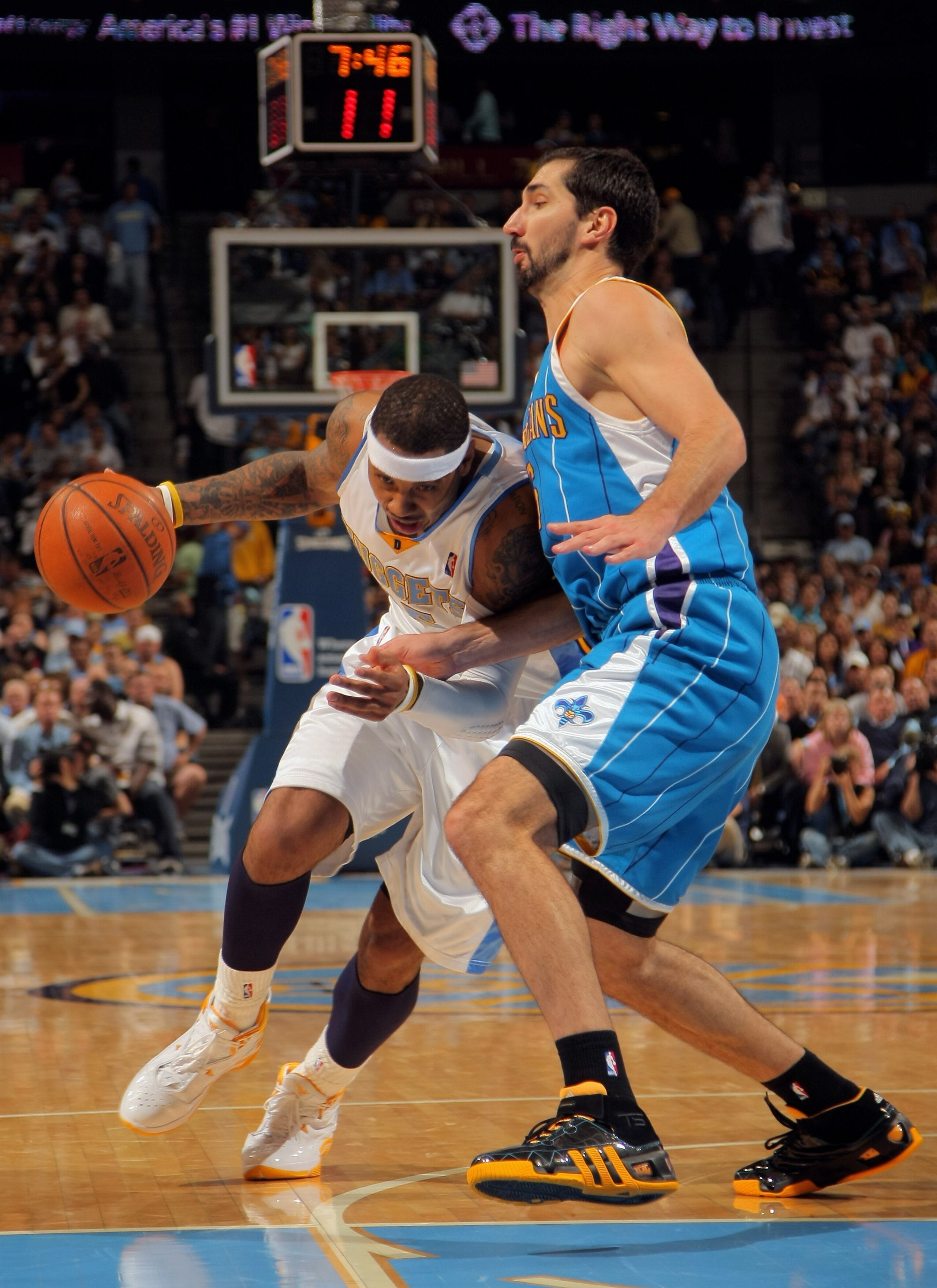 DENVER - APRIL 29:  Carmelo Anthony #15 of the Denver Nuggets drives against Peja Stojakovic #16 of the New Orleans Hornets in Game Five of the Western Conference Quarterfinals during the 2009 NBA Playoffs at Pepsi Center on April 29, 2009 in Denver, Colo