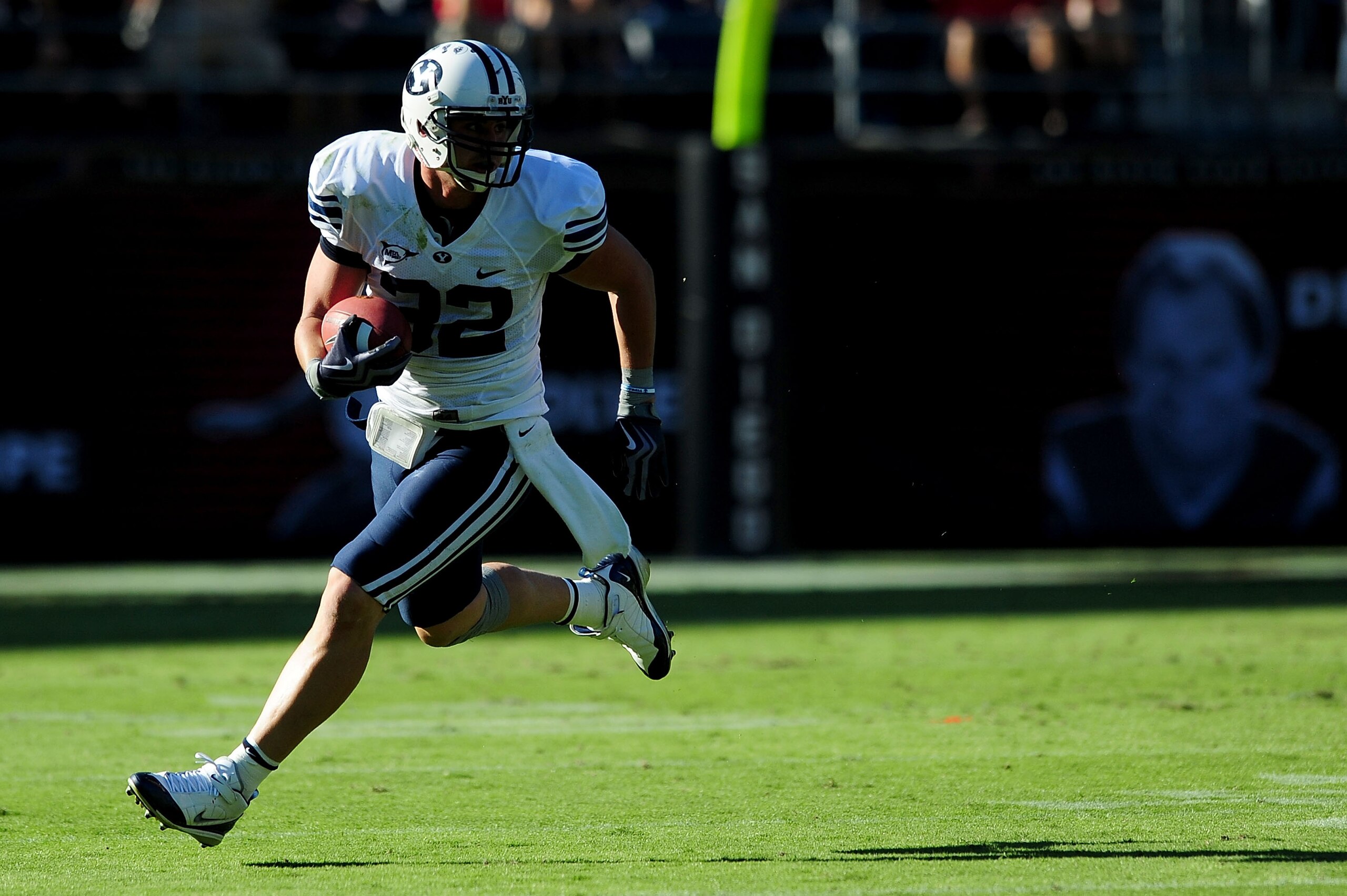 SAN DIEGO - OCTOBER 17: Andrew Rich #22 of BYU Cougars runs the ball against San Diego State Aztecs at Qualcomm Stadium on October 17, 2009 in San Diego, California.  (Photo by Jacob de Golish/Getty Images)
