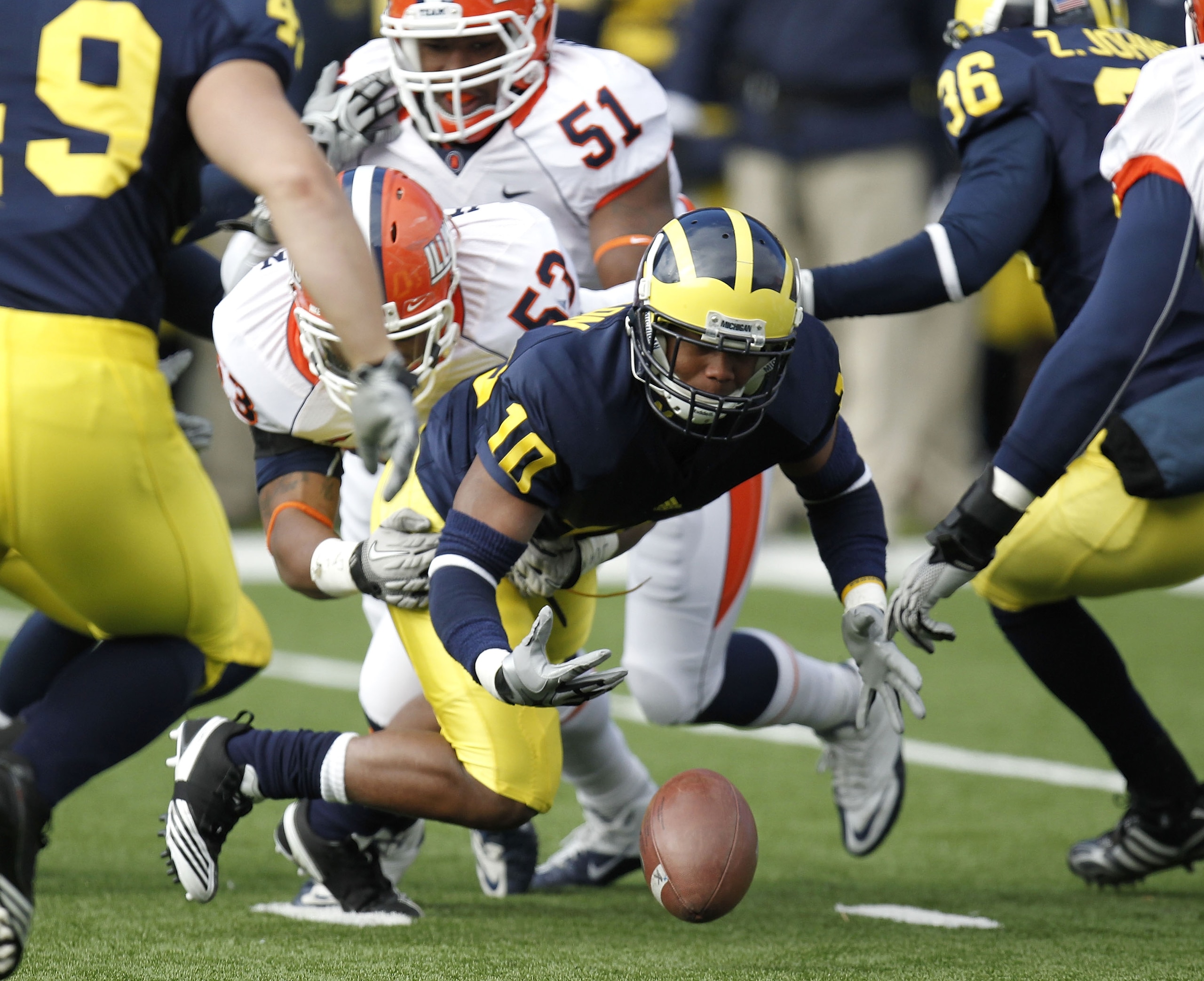 ANN ARBOR, MI - NOVEMBER 06: Jeremy Gallon #10 of the Michigan Wolverines fumbles a kickoff return after being hit by Dustin Jefferson #53 of the Illinios Fighting Illini at Michigan Stadium on November 6, 2010 in Ann Arbor, Michigan. Michigan won the ga ANN ARBOR, MI - NOVEMBER 06: Jeremy Gallon #10 of the Michigan Wolverines fumbles a kickoff return after being hit by Dustin Jefferson #53 of the Illinios Fighting Illini at Michigan Stadium on November 6, 2010 in Ann Arbor, Michigan. Michigan won the ga