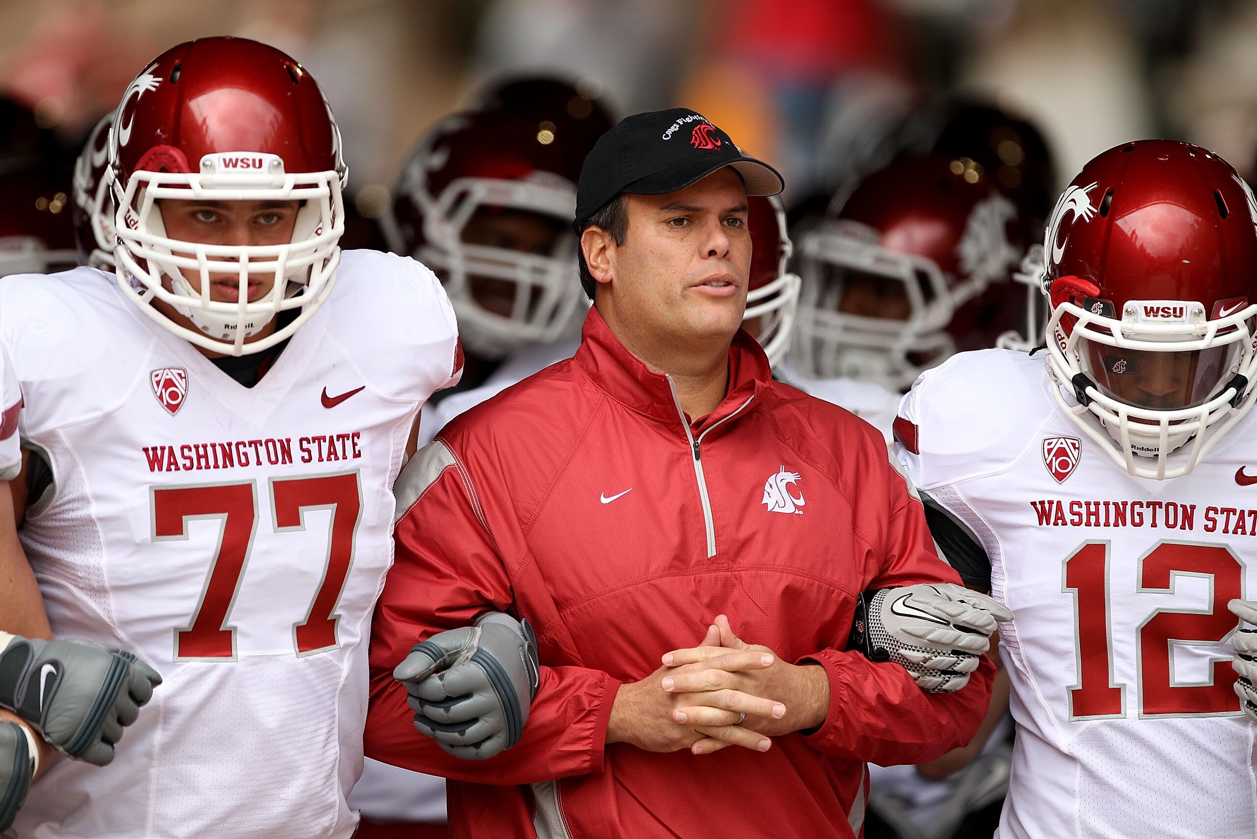PALO ALTO, CA - OCTOBER 23: Head coach Paul Wulff of the Washington State Cougars walks out of the tunnel with John Fullington #77 and Jeffrey Solomon #12 for their game against the Stanford Cardinal at Stanford Stadium on October 23, 2010 in Palo Alto, PALO ALTO, CA - OCTOBER 23: Head coach Paul Wulff of the Washington State Cougars walks out of the tunnel with John Fullington #77 and Jeffrey Solomon #12 for their game against the Stanford Cardinal at Stanford Stadium on October 23, 2010 in Palo Alto,