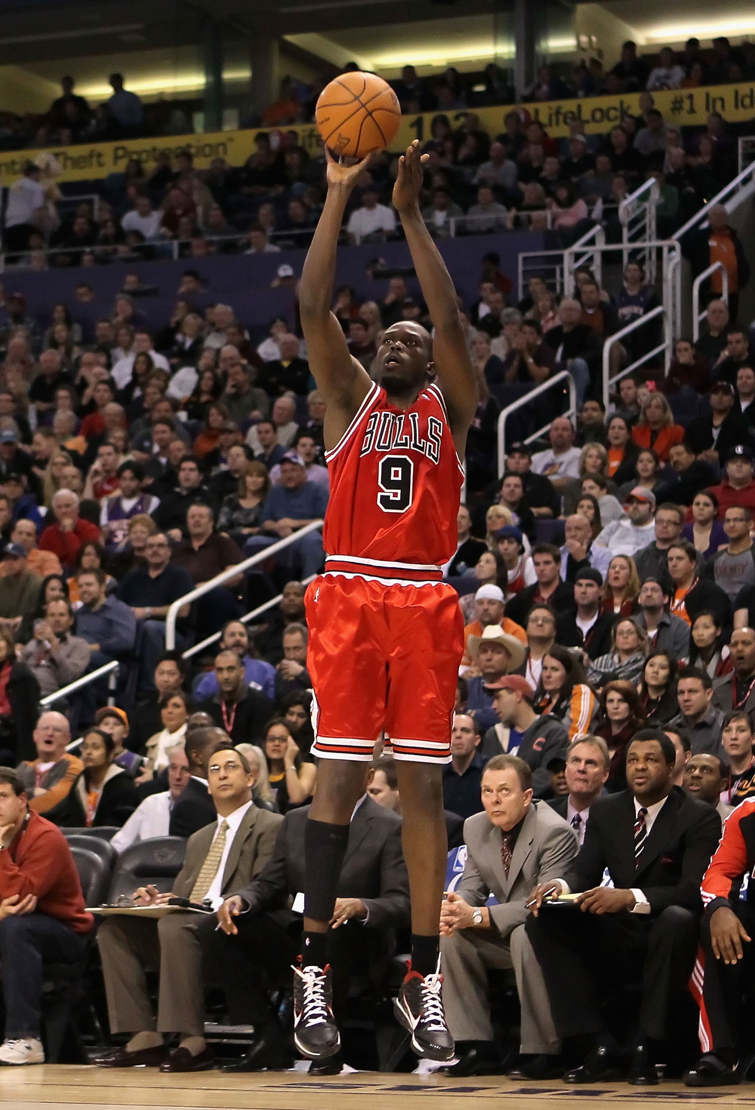 PHOENIX - JANUARY 22: Luol Deng #9 of the Chicago Bulls puts up a three point shot against the Phoenix Suns during the NBA game at US Airways Center on January 22, 2010 in Phoenix, Arizona. The Bulls defeated the Suns 115-104. NOTE TO USER: User express PHOENIX - JANUARY 22: Luol Deng #9 of the Chicago Bulls puts up a three point shot against the Phoenix Suns during the NBA game at US Airways Center on January 22, 2010 in Phoenix, Arizona. The Bulls defeated the Suns 115-104. NOTE TO USER: User express