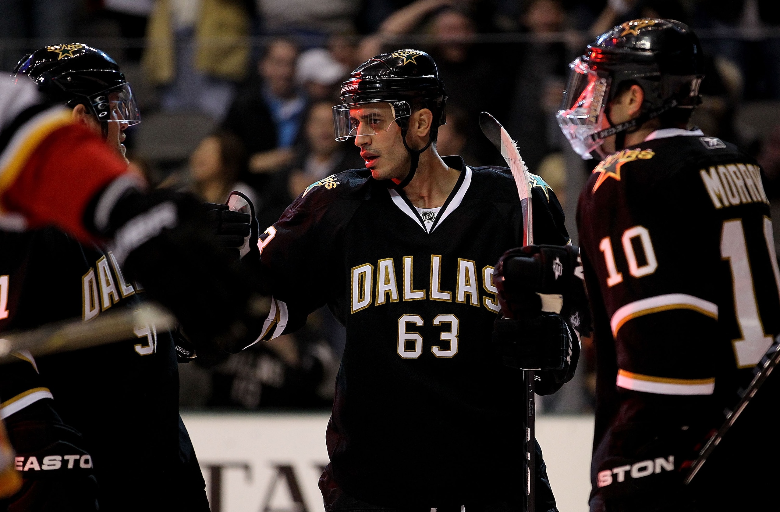 DALLAS, TX - DECEMBER 23:   Center Mike Ribeiro #63 of the Dallas Stars celebrates his power play goal against the Calgary Flames at American Airlines Center on December 23, 2010 in Dallas, Texas.  (Photo by Ronald Martinez/Getty Images)