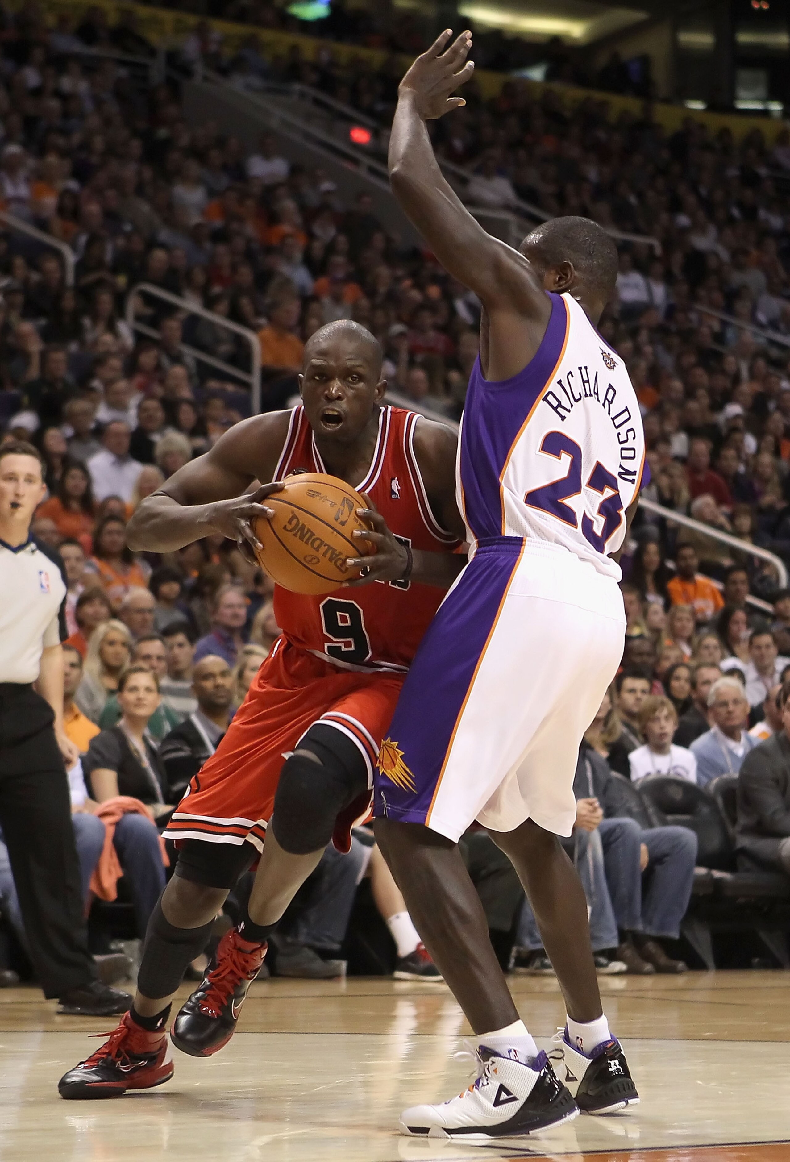 PHOENIX - NOVEMBER 24: Luol Deng #9 of the Chicago Bulls drives to the basket during the NBA game against the Phoenix Suns at US Airways Center on November 24, 2010 in Phoenix, Arizona. The Bulls defeated the Suns 123-115 in double overtime. NOTE TO USE PHOENIX - NOVEMBER 24: Luol Deng #9 of the Chicago Bulls drives to the basket during the NBA game against the Phoenix Suns at US Airways Center on November 24, 2010 in Phoenix, Arizona. The Bulls defeated the Suns 123-115 in double overtime. NOTE TO USE