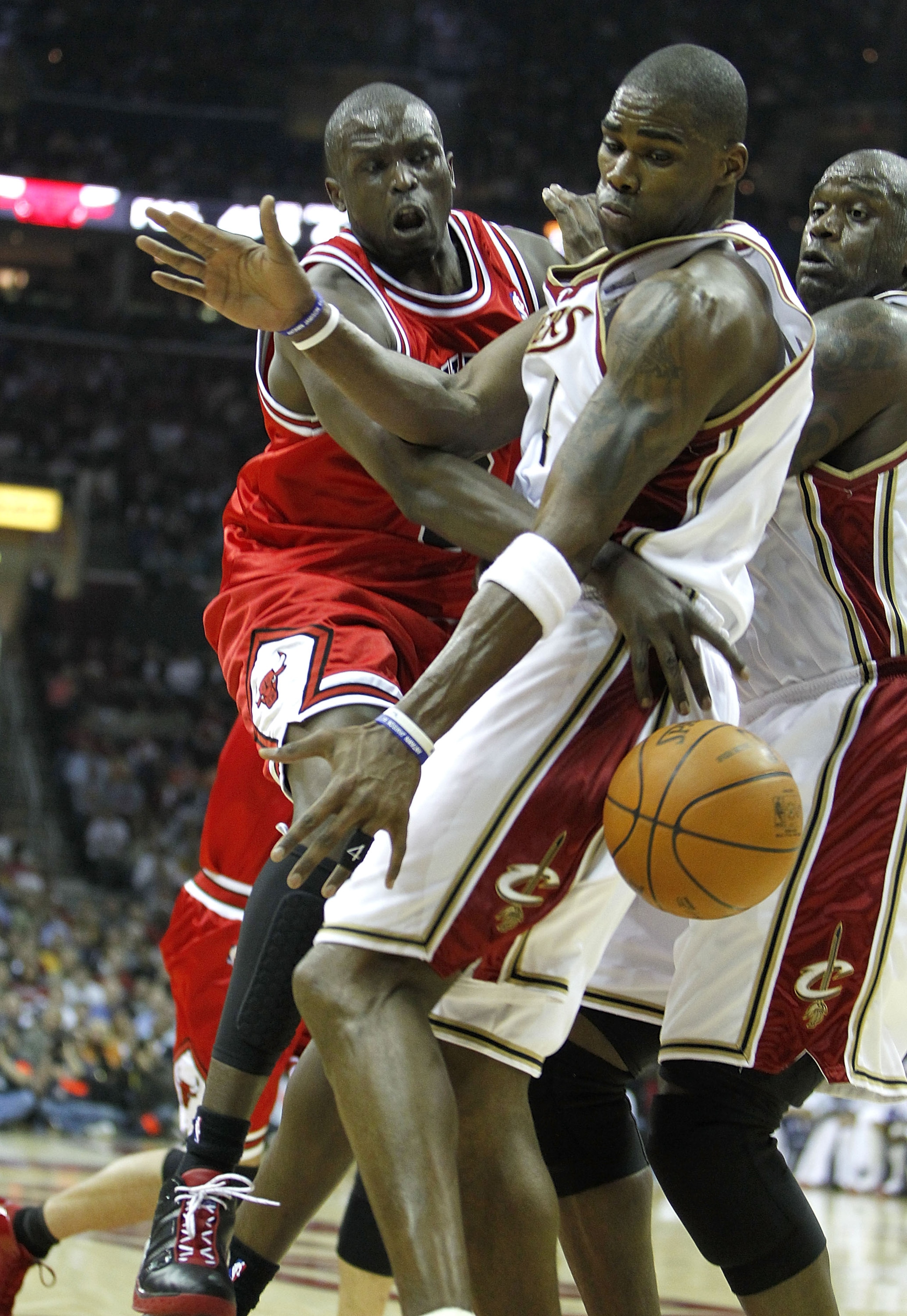 CLEVELAND - APRIL 27: Luol Deng #9 of the Chicago Bulls tries to pass around Antawn Jamison #4 of the Cleveland Cavaliers in Game Five of the Eastern Conference Quarterfinals during the 2010 NBA Playoffs at Quicken Loans Arena on April 27, 2010 in Clevela CLEVELAND - APRIL 27: Luol Deng #9 of the Chicago Bulls tries to pass around Antawn Jamison #4 of the Cleveland Cavaliers in Game Five of the Eastern Conference Quarterfinals during the 2010 NBA Playoffs at Quicken Loans Arena on April 27, 2010 in Clevela