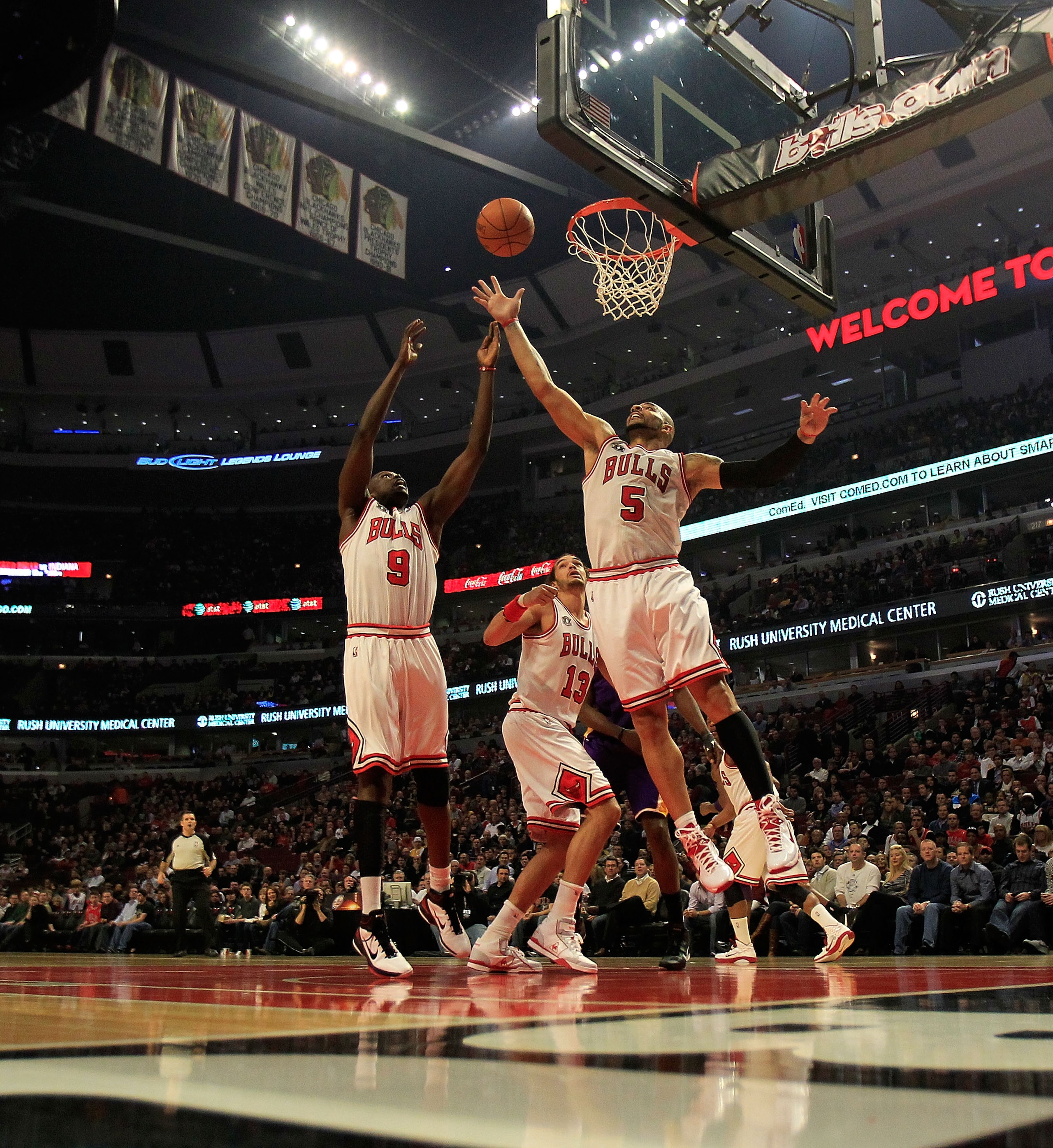 CHICAGO, IL - DECEMBER 10: Luol Deng #9 and Carlos Boozer #5 of the Chicago Bulls leap for a rebound against the Los Angeles Lakers at the United Center on December 10, 2010 in Chicago, Illinois. NOTE TO USER: User expressly acknowledges and agrees that, CHICAGO, IL - DECEMBER 10: Luol Deng #9 and Carlos Boozer #5 of the Chicago Bulls leap for a rebound against the Los Angeles Lakers at the United Center on December 10, 2010 in Chicago, Illinois. NOTE TO USER: User expressly acknowledges and agrees that,