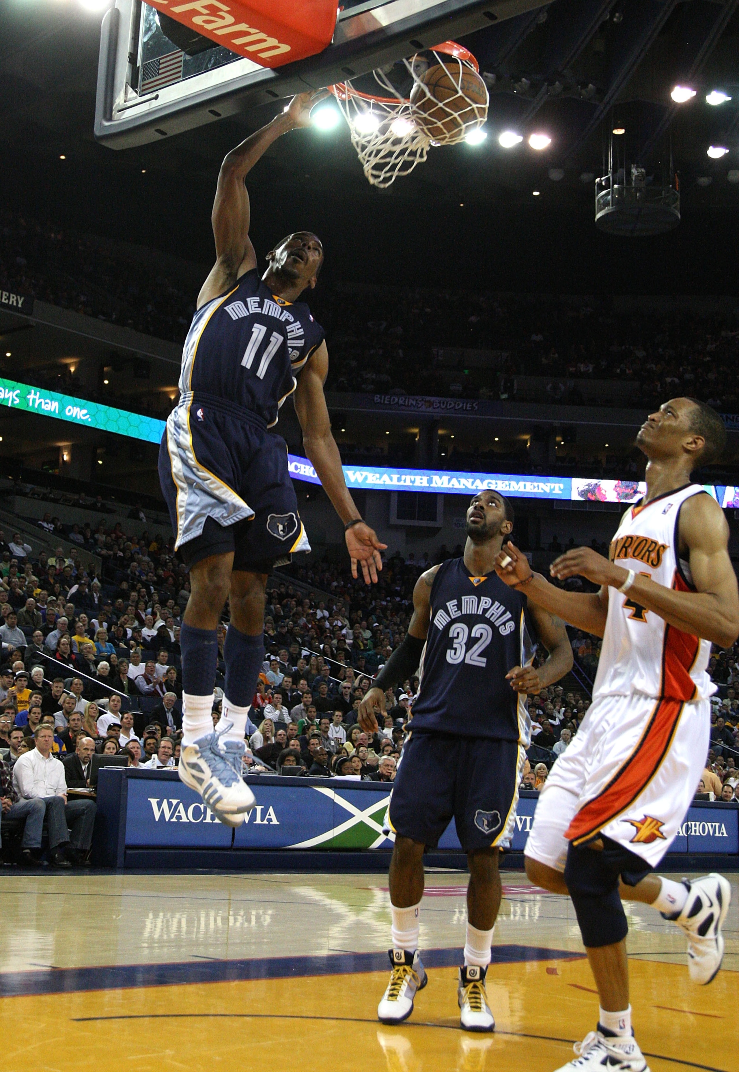 OAKLAND, CA - MARCH 30: Mike Conley #11 of the Memphis Grizzlies shoots over Anthony Randolph #4 of the Golden State Warriors during an NBA game on March 30, 2009 at Oracle Arena in Oakland, California. NOTE TO USER: User expressly acknowledges and agree OAKLAND, CA - MARCH 30: Mike Conley #11 of the Memphis Grizzlies shoots over Anthony Randolph #4 of the Golden State Warriors during an NBA game on March 30, 2009 at Oracle Arena in Oakland, California. NOTE TO USER: User expressly acknowledges and agree