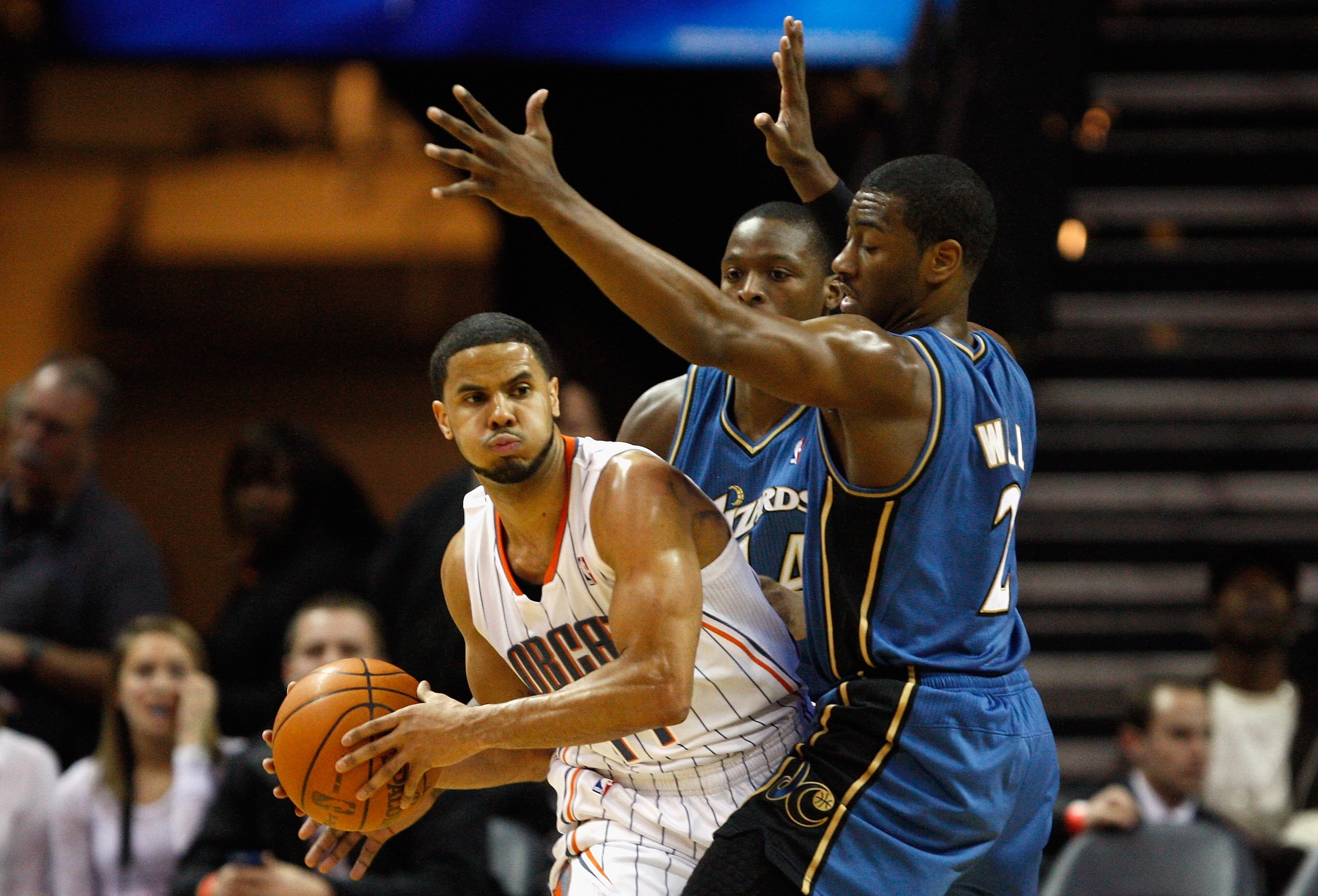 CHARLOTTE, NC - JANUARY 08: Teammates John Wall #2 and Al Thornton #14 of the Washington Wizards trap D.J. Augustin #14 of the Charlotte Bobcats during their game at Time Warner Cable Arena on January 8, 2011 in Charlotte, North Carolina. NOTE TO USER: U CHARLOTTE, NC - JANUARY 08: Teammates John Wall #2 and Al Thornton #14 of the Washington Wizards trap D.J. Augustin #14 of the Charlotte Bobcats during their game at Time Warner Cable Arena on January 8, 2011 in Charlotte, North Carolina. NOTE TO USER: U