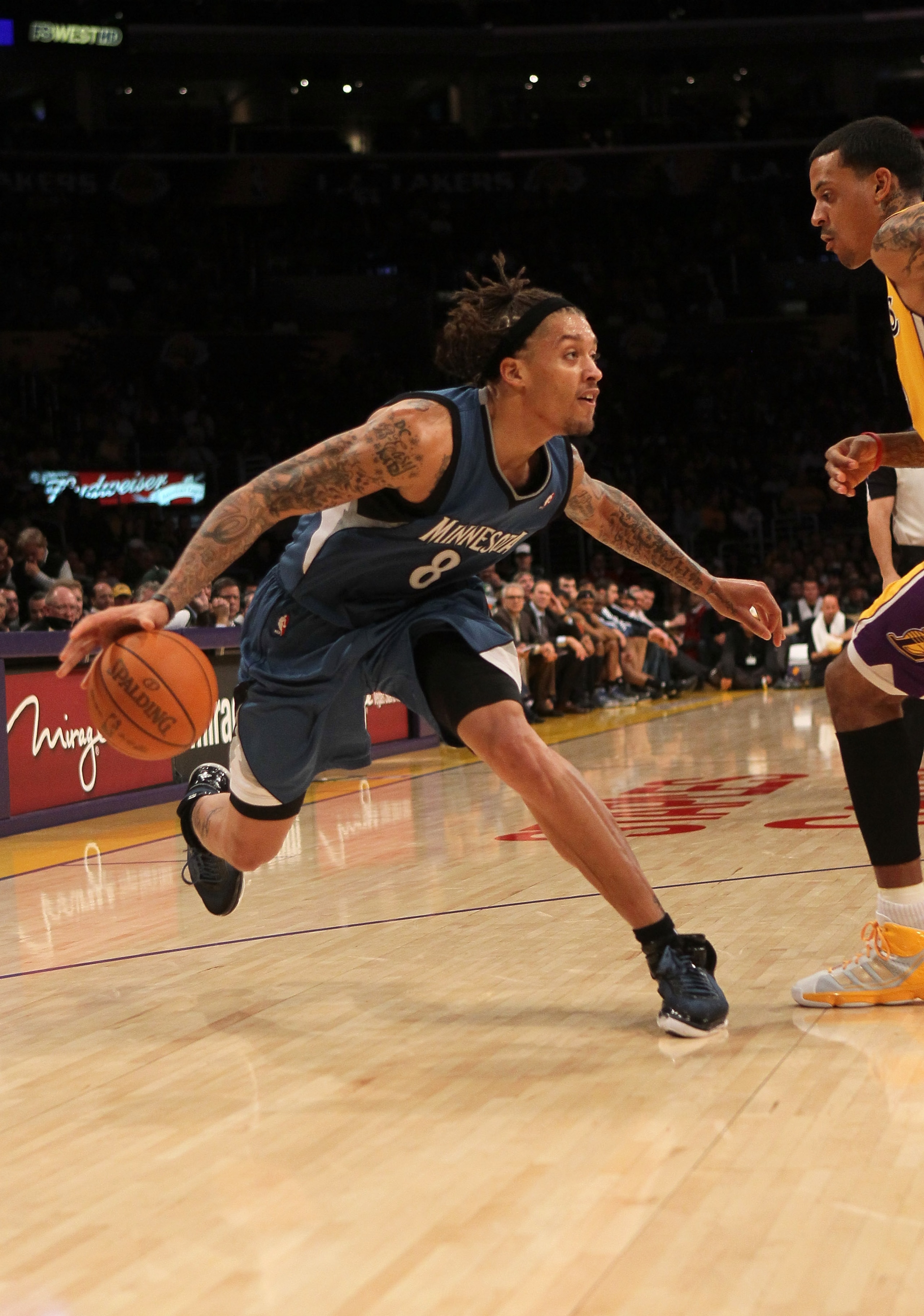 LOS ANGELES, CA - NOVEMBER 09: Michael Beasley #8 of the Minnesota Timberwolves drives against Matt Barnes #9 of the Los Angeles Lakers at Staples Center on November 9, 2010 in Los Angeles, California. The Lakers won 99-94. NOTE TO USER: User expressly LOS ANGELES, CA - NOVEMBER 09: Michael Beasley #8 of the Minnesota Timberwolves drives against Matt Barnes #9 of the Los Angeles Lakers at Staples Center on November 9, 2010 in Los Angeles, California. The Lakers won 99-94. NOTE TO USER: User expressly
