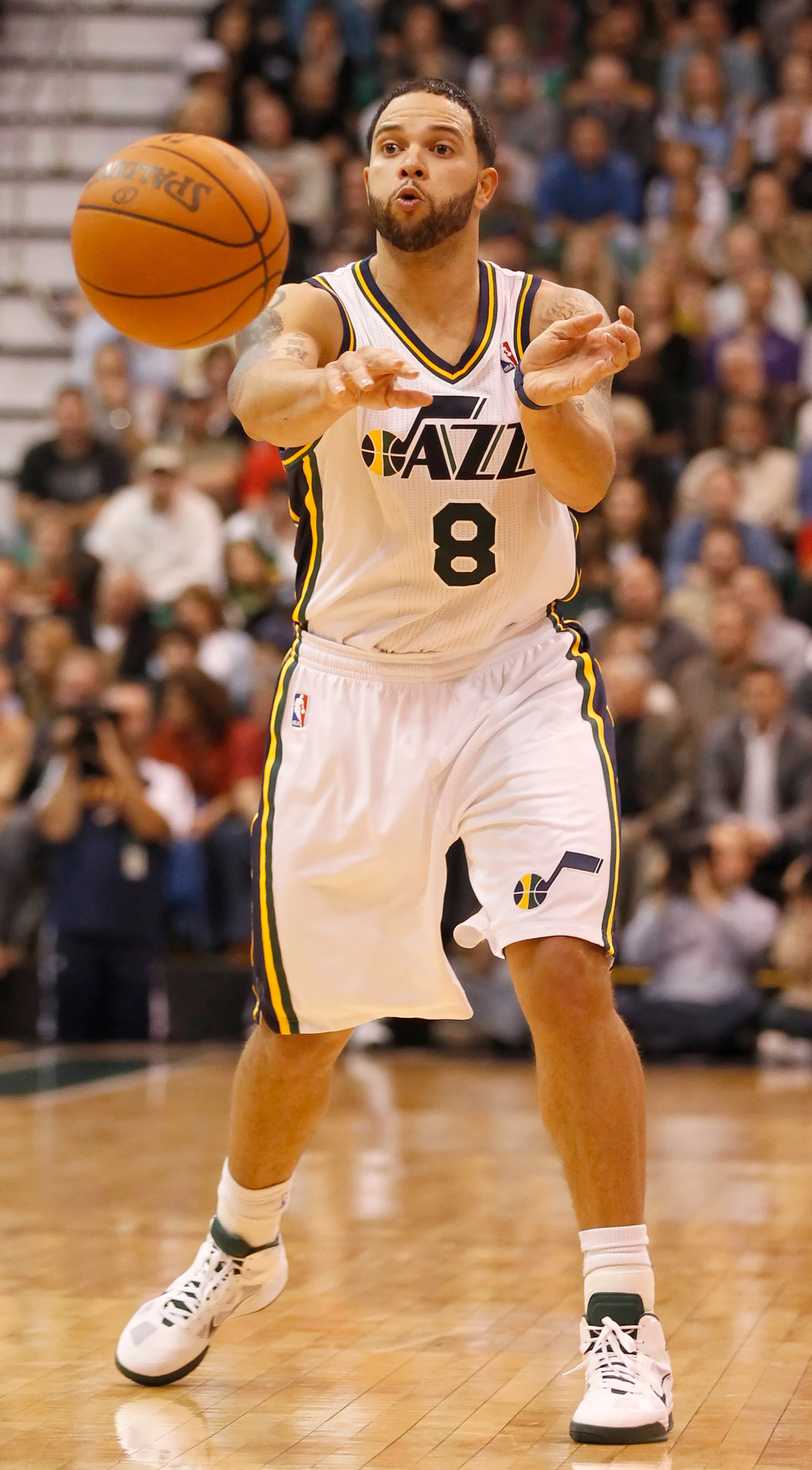 SALT LAKE CITY, UT - DECEMBER 8: Deron Williams #8 of the Utah Jazz passes the ball during a game against the Miami Heat during the second half of an NBA game December 8, 2010 at Energy Solutions Arena in Salt Lake City, Utah. The Heat beat the Jazz 111- SALT LAKE CITY, UT - DECEMBER 8: Deron Williams #8 of the Utah Jazz passes the ball during a game against the Miami Heat during the second half of an NBA game December 8, 2010 at Energy Solutions Arena in Salt Lake City, Utah. The Heat beat the Jazz 111-
