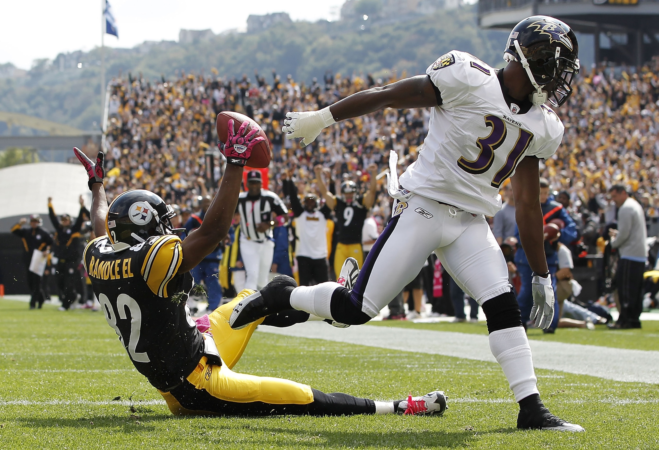 PITTSBURGH - OCTOBER 03:  Antwaan Randle El #82 of the Pittsburgh Steelers reacts after a first quarter catch next to Fabian Washington #31 of the Baltimore Ravens on October 3, 2010 at Heinz Field in Pittsburgh, Pennsylvania.  (Photo by Gregory Shamus/Ge