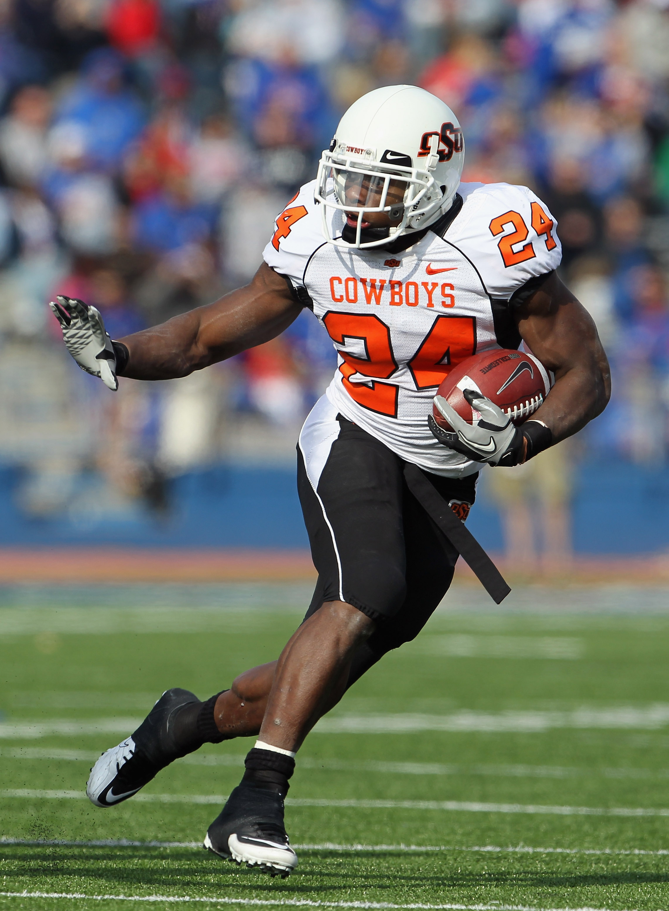 LAWRENCE, KS - NOVEMBER 20: Running back Kendall Hunter #24 of the Oklahoma State Cowboys carries the ball during the game against the Kansas Jayhawks on November 20, 2010 at Memorial Stadium in Lawrence, Kansas. (Photo by Jamie Squire/Getty Images)