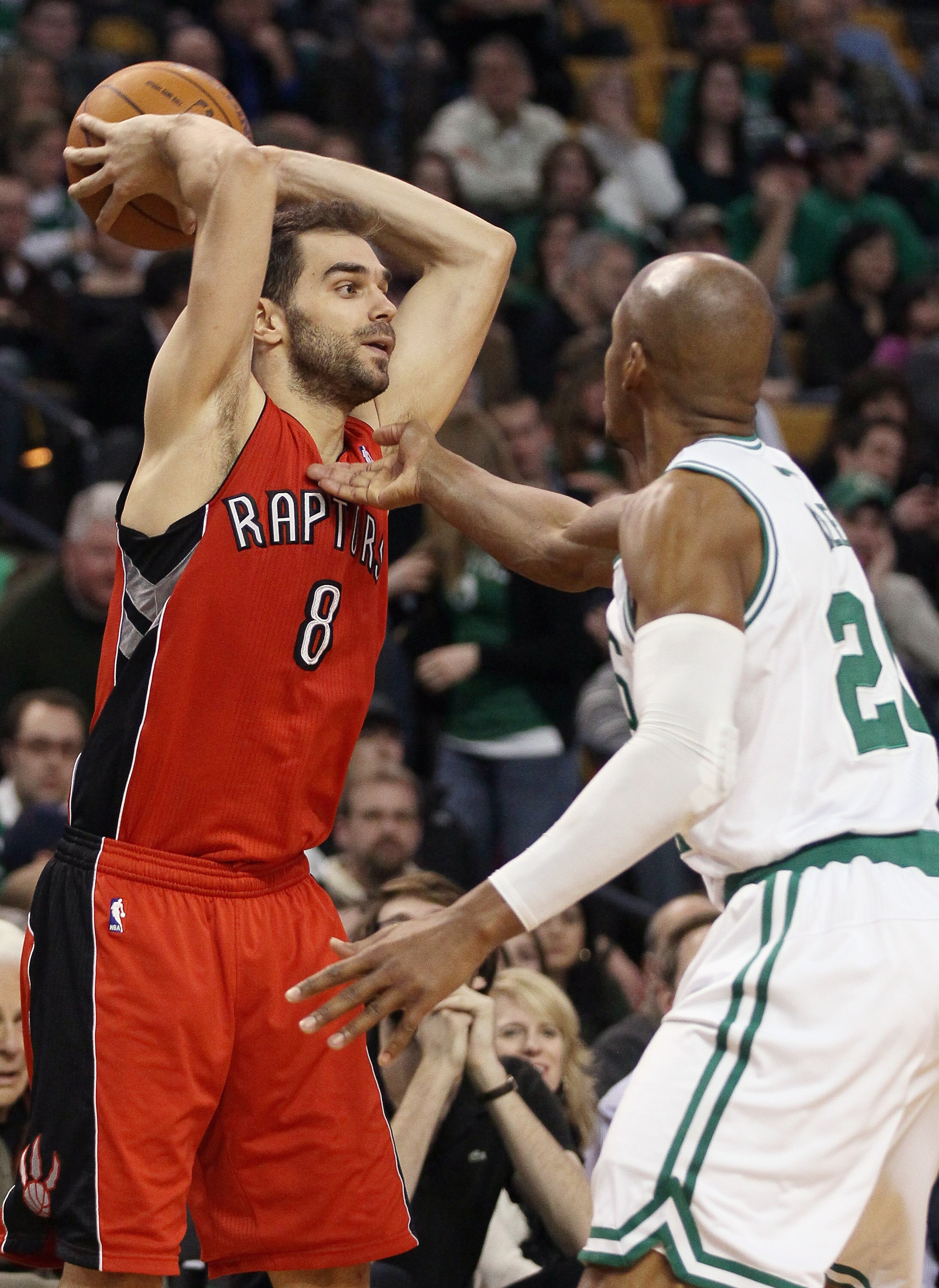 BOSTON, MA - JANUARY 07:  Jose Calderon #8 of the Toronto Raptors looks to pass as Ray Allen #20 of the Boston Celtics defends on January 7, 2011 at the TD Garden in Boston, Massachusetts. The Celtics defeated the Raptors 122-102. NOTE TO USER: User expre