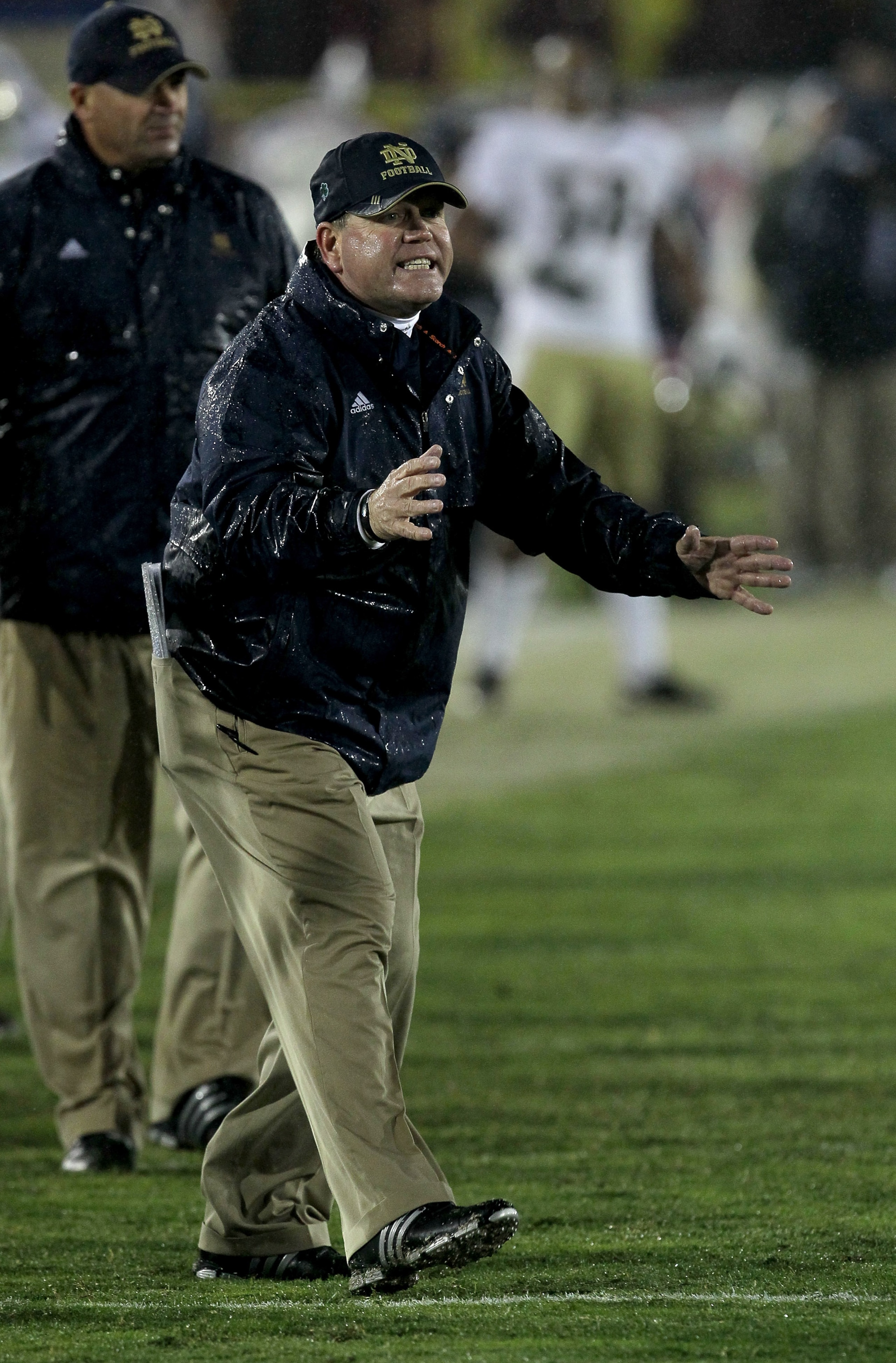 LOS ANGELES - NOVEMBER 27: Head coach Brian Kelly of the Notre Dame Fighting Irish gestures during the game with the USC Trojans at the Los Angeles Memorial Coliseum on November 27, 2010 in Los Angeles, California.  Notre Dame won 20-16.  (Photo by Stephe