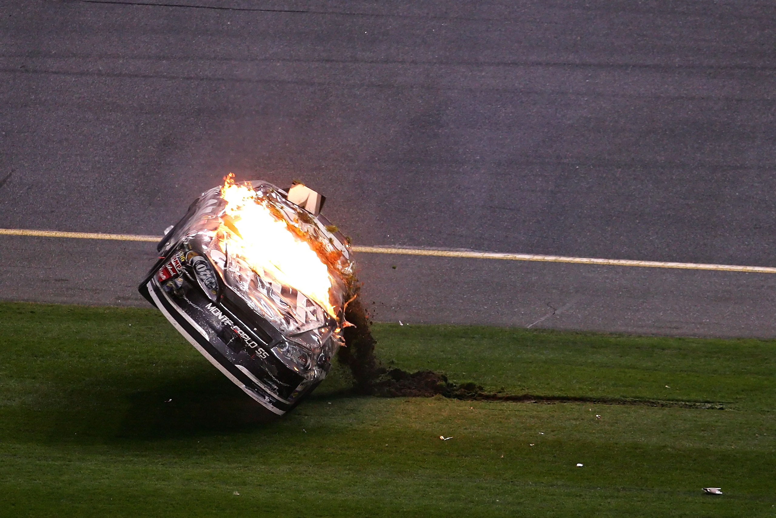 DAYTONA, FL - FEBRUARY 18:  Clint Bowyer, driver of the #07 Jack Daniel's Chevrolet, flips right side up after crashing on the last lap, during the NASCAR Nextel Cup Series Daytona 500 at Daytona International Speedway on February 18, 2007 in Daytona, Flo