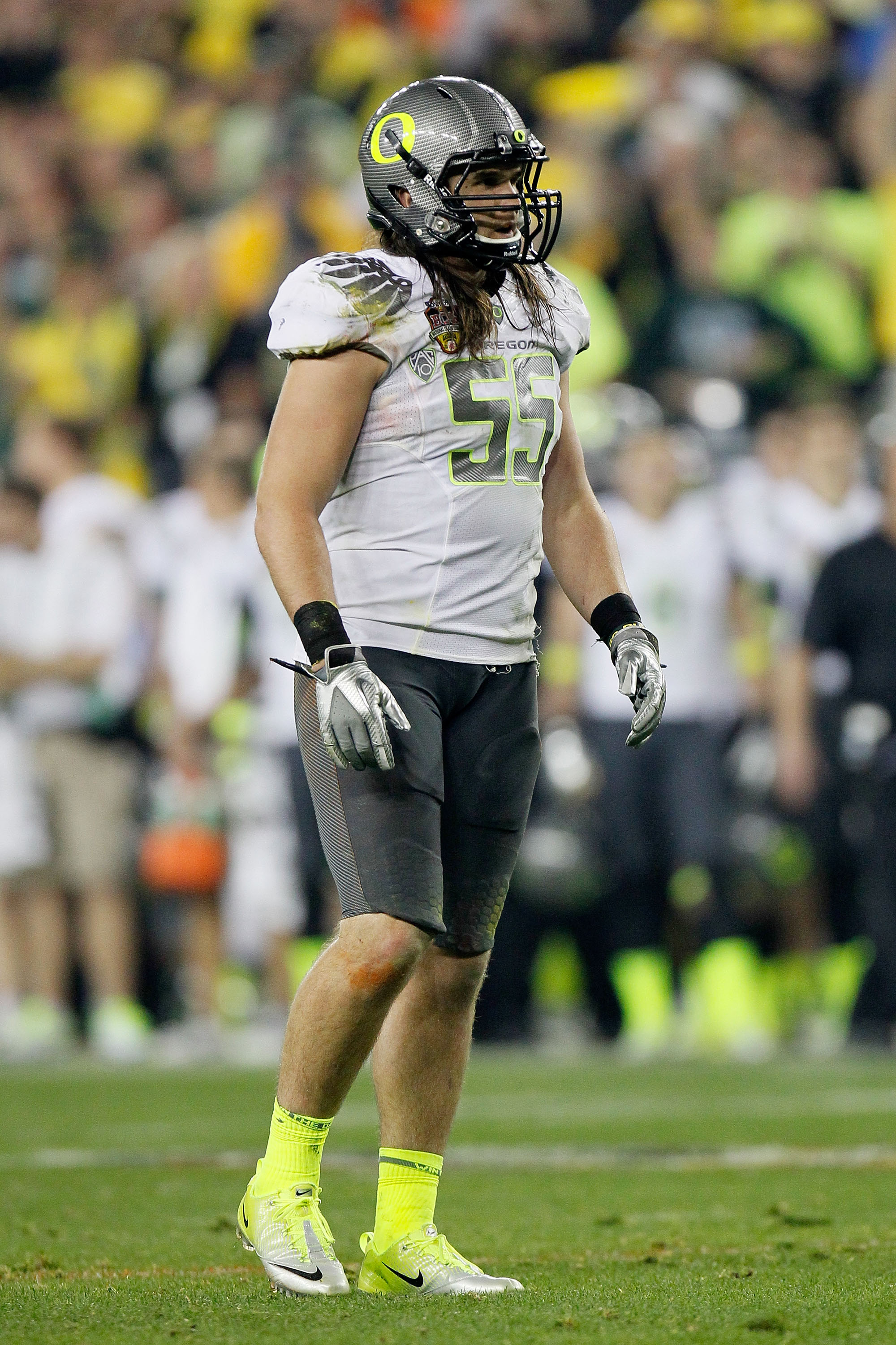 GLENDALE, AZ - JANUARY 10: Casey Matthews #55 of the Oregon Ducks looks on against the Auburn Tigers during the Tostitos BCS National Championship Game at University of Phoenix Stadium on January 10, 2011 in Glendale, Arizona. (Photo by Kevin C. Cox/Get