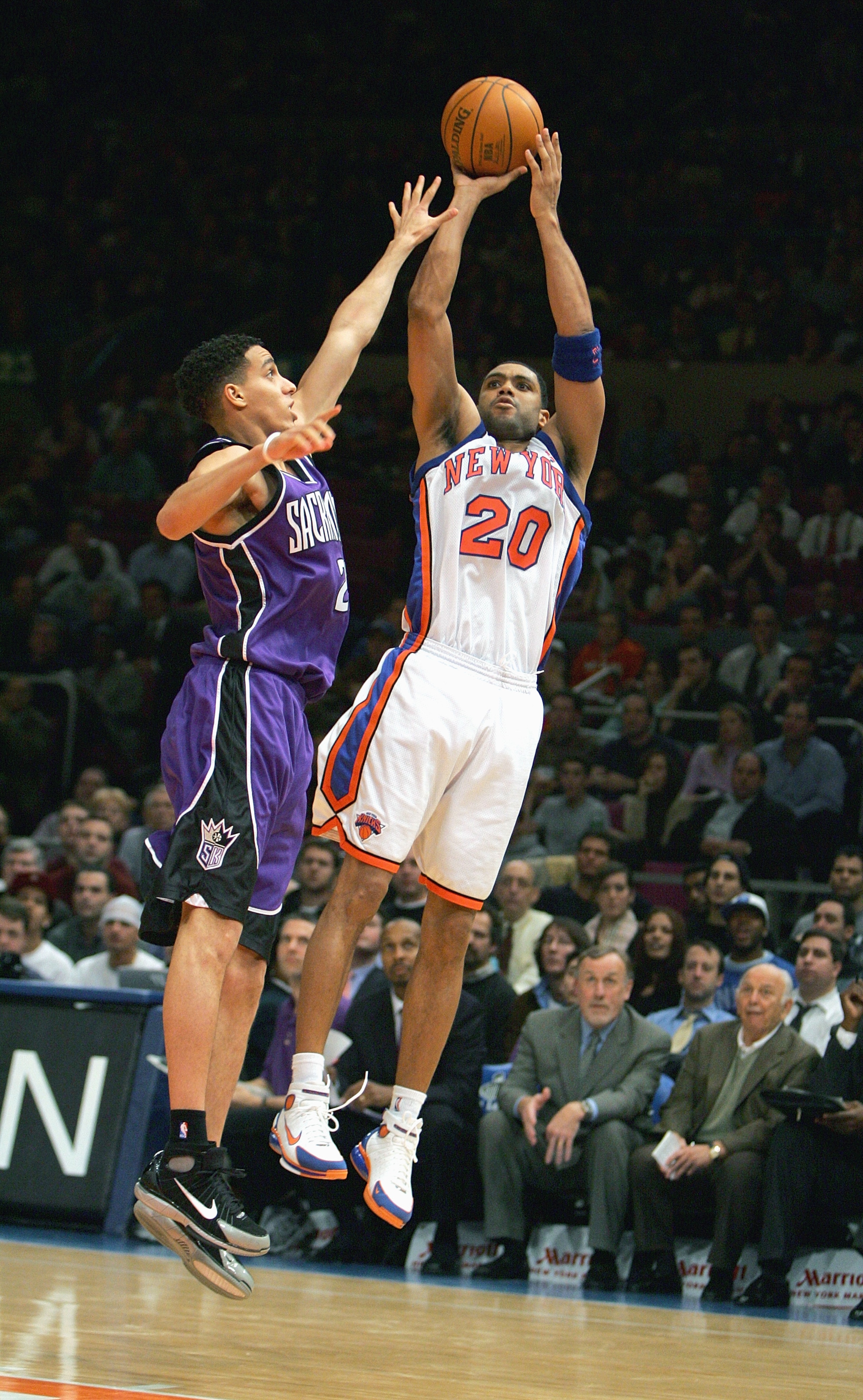 NEW YORK - JANUARY 4:  Allan Houston #20 of the New York Knicks shoots a jump shot against Kevin Martin #23 of the Sacramento Kings on January 4, 2005 at Madison Square Garden in New York City. The Kings won 105-98.  NOTE TO USER: User expressly acknowled