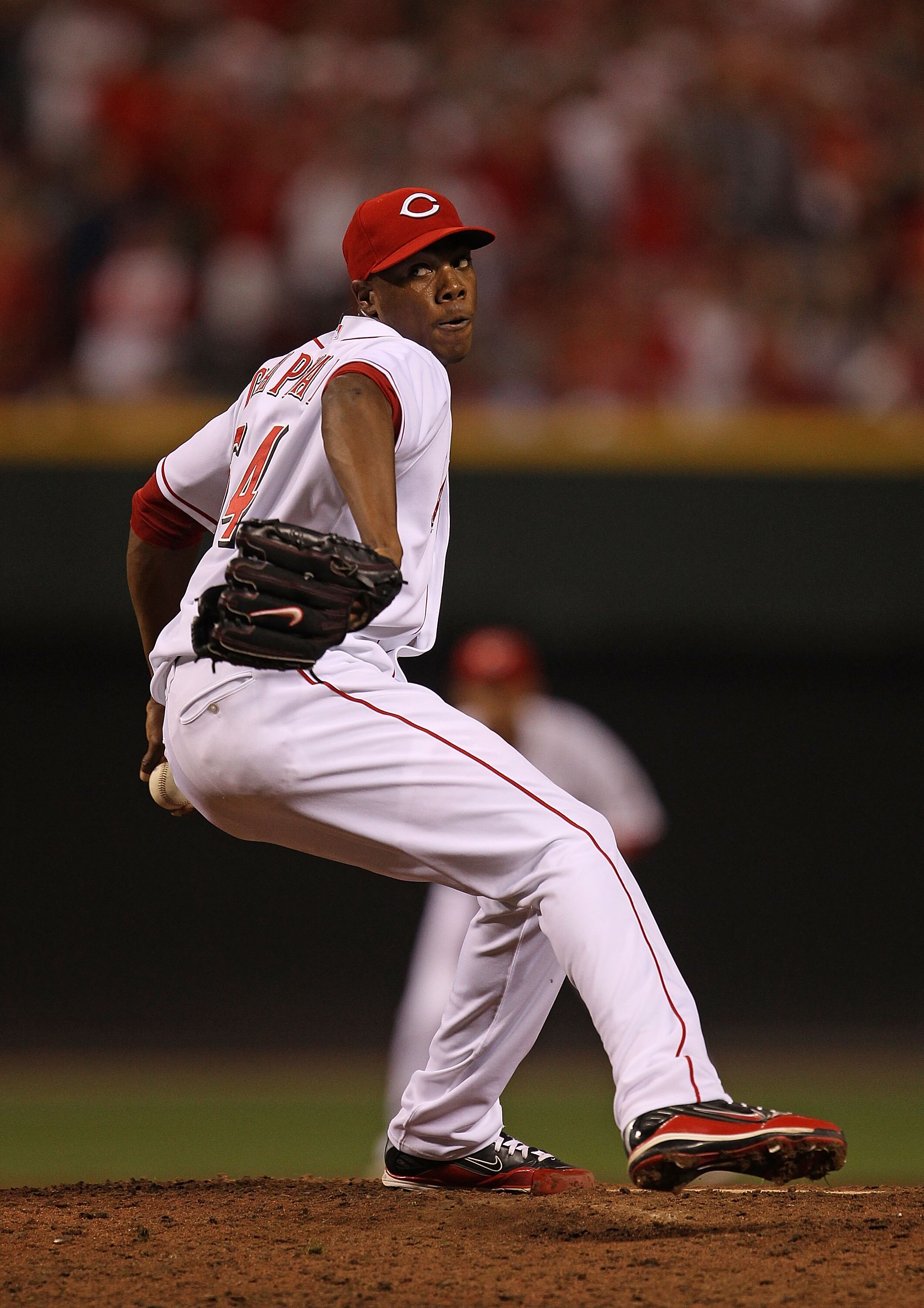 CINCINNATI - OCTOBER 10: Aroldis Chapman #54 of the Cincinnati Reds pitches in the 9th inning against the Philadelphia Phillies during game 3 of the NLDS at Great American Ball Park on October 10, 2010 in Cincinnati, Ohio. The Phillies defeated the Reds 2