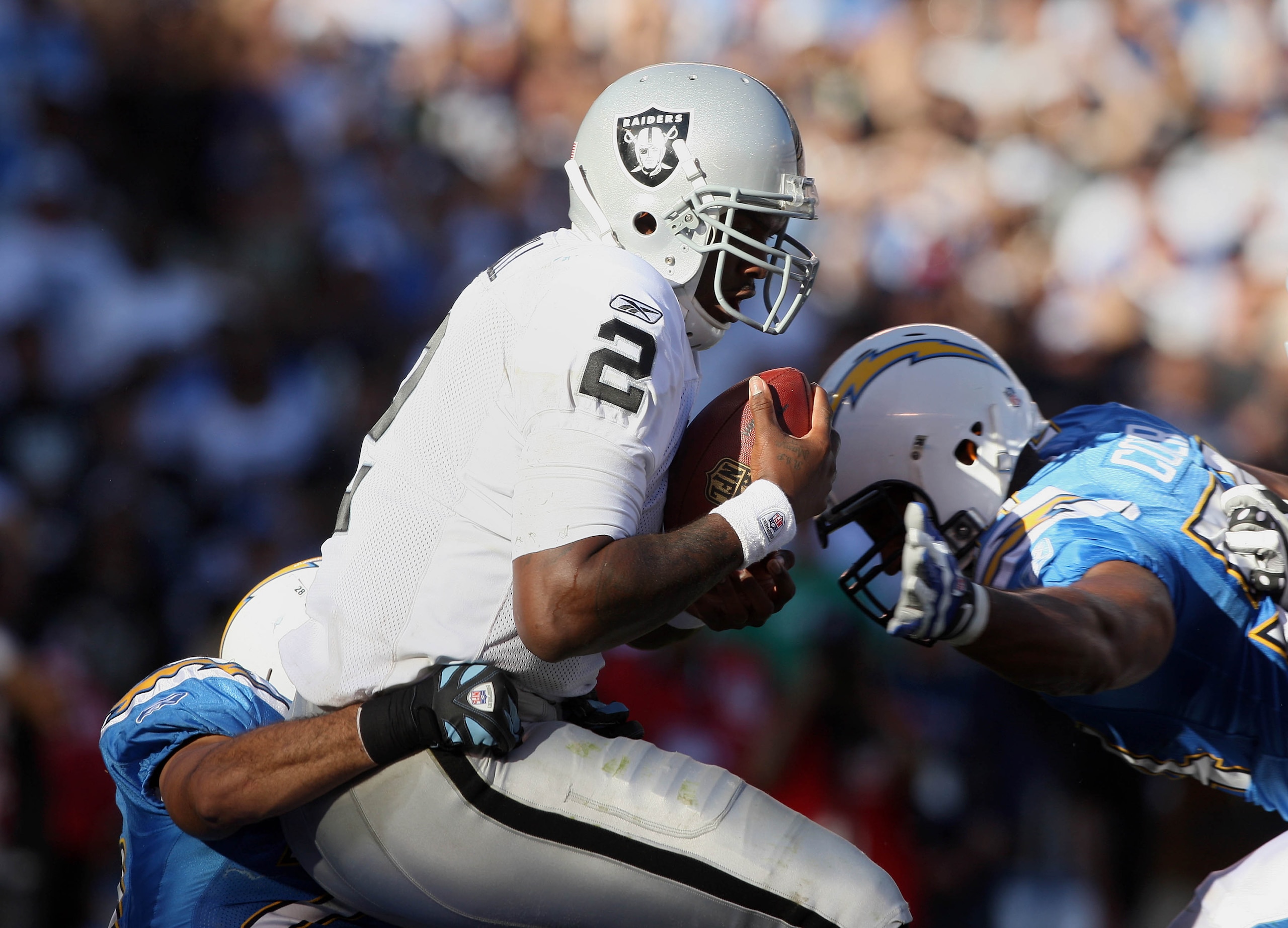 SAN DIEGO, CA - NOVEMBER 1:   Quarterback JaMarcus Russell #2 of the Oakland Raiders is sacked by Steve Gregory #28 of the San DIego Chargers in the 2nd half on November 1, 2009 at Qualcomm Stadium in San Diego, California. (Photo By Donald Miralle/Getty
