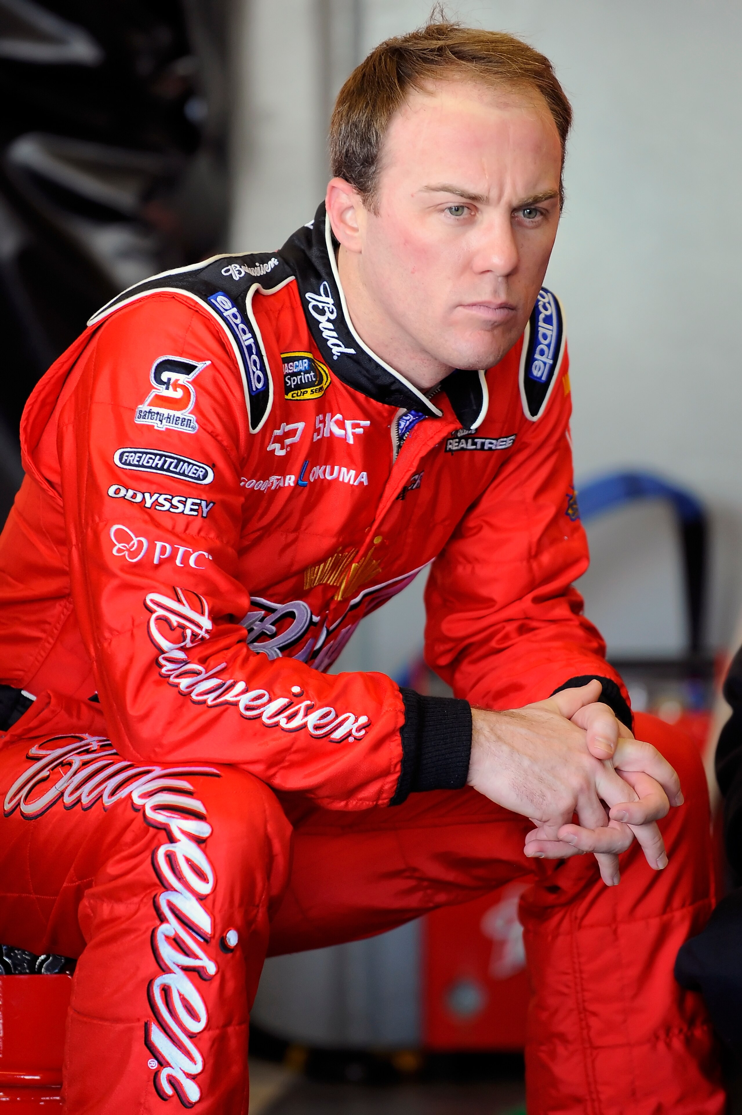DAYTONA BEACH, FL - JANUARY 20:  Kevin Harvick, driver of the #29 Budweiser Chevrolet, waits in the garage during a test session at Daytona International Speedway on January 20, 2011 in Daytona Beach, Florida.  (Photo by Jared C. Tilton/Getty Images for N