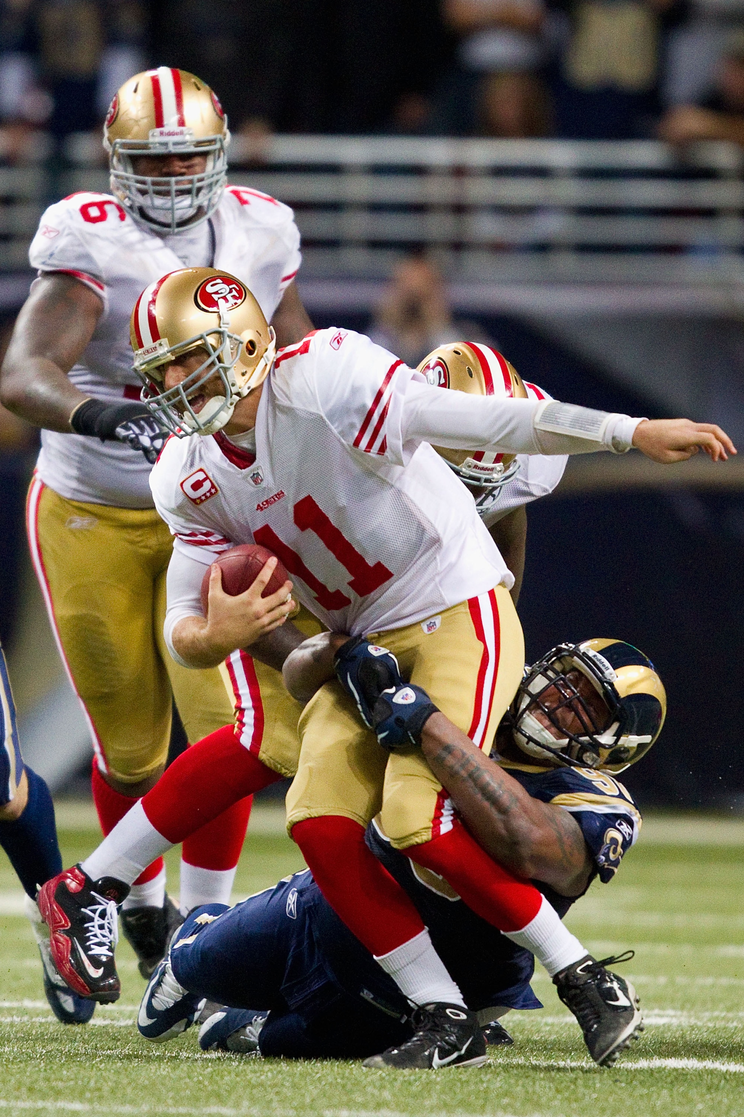 ST. LOUIS, MO - DECEMBER 26: Fred Robbins #98 of the St. Louis Rams sacks Alex Smith #11 of the San Francisco 49ers at the Edward Jones Dome on December 26, 2010 in St. Louis, Missouri. The Rams beat the 49ers 25-17. (Photo by Dilip Vishwanat/Getty Images