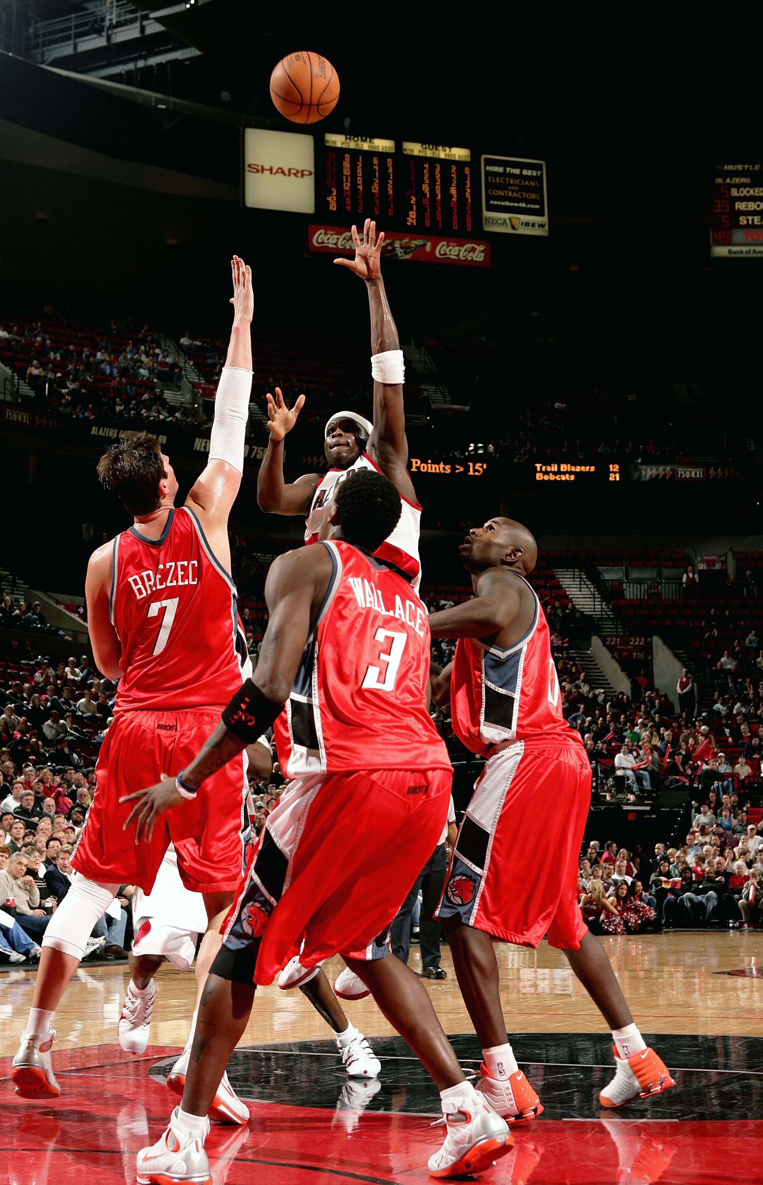 PORTLAND, OR - FEBRUARY 4:  Zach Randolph #50 of the Portland Trail Blazers puts up a shot over Primoz Brezec #7, Gerald Wallace #3 and Theron Smith #0 of the Charlotte Bobcats on February 4, 2005 at the Rose Garden in Portland, Oregon. The Blazers defeat