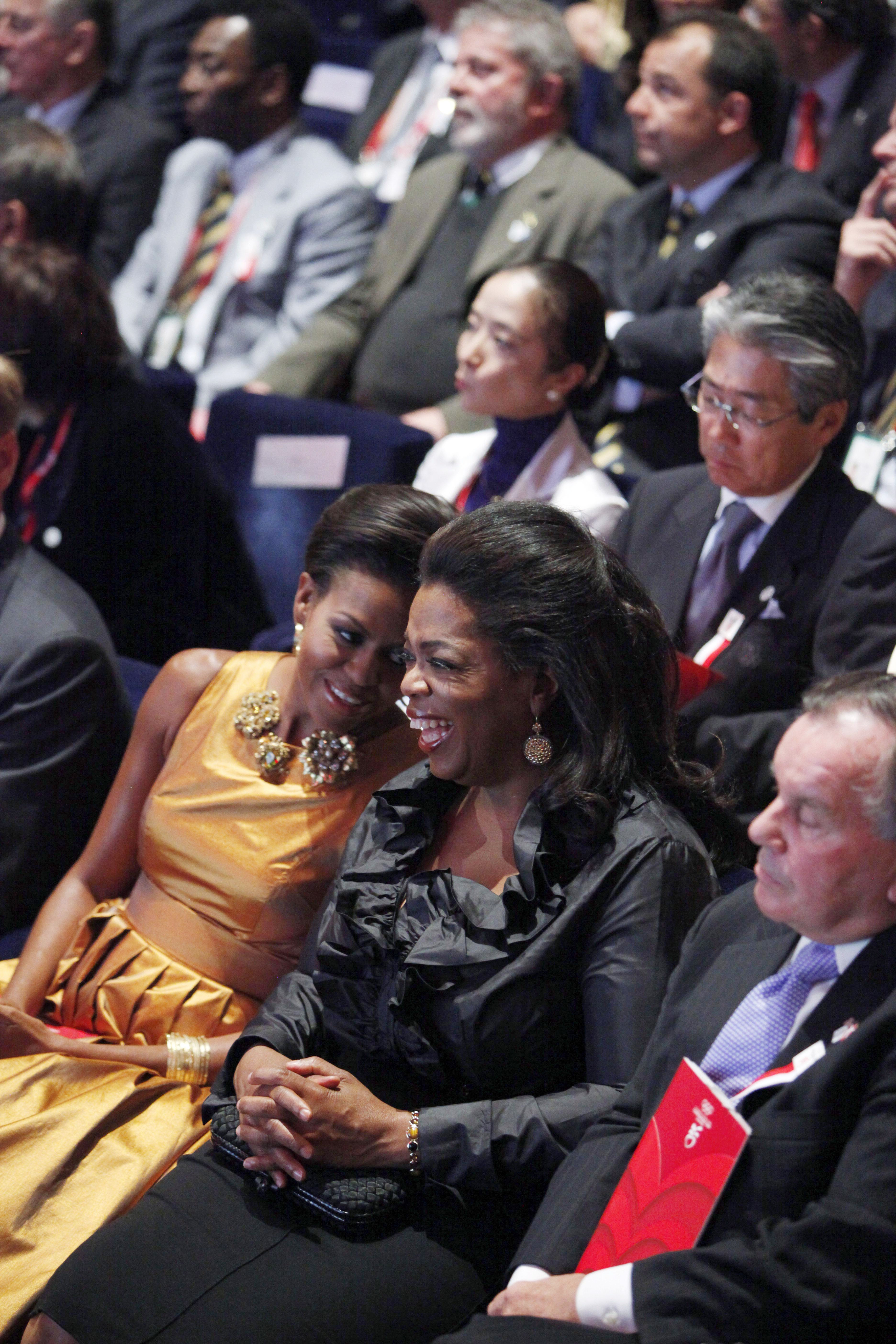 COPENHAGEN, DENMARK - OCTOBER 1:  U.S. first lady Michelle Obama sits with television talk show host Oprah Winfrey, second right, and Chicago Mayor Richard M. Daley, right, at the opening Ceremony of the 121st IOC Session at the Copenhagen Opera House on