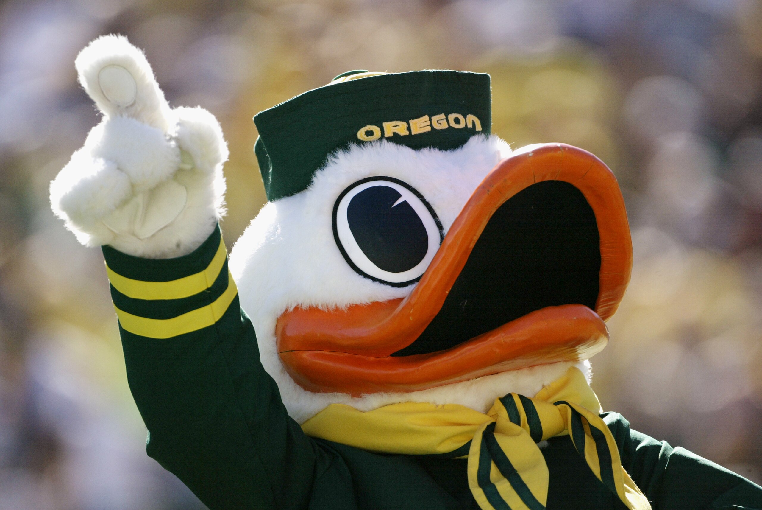 EUGENE, OR - SEPTEMBER 27:  The University of Oregon Ducks mascot plays to the crowd during the game against the Washington State University Cougars at Autzen Stadium on September 27, 2003 in Eugene, Oregon. Washington State defeated Oregon 55-16.  (Photo