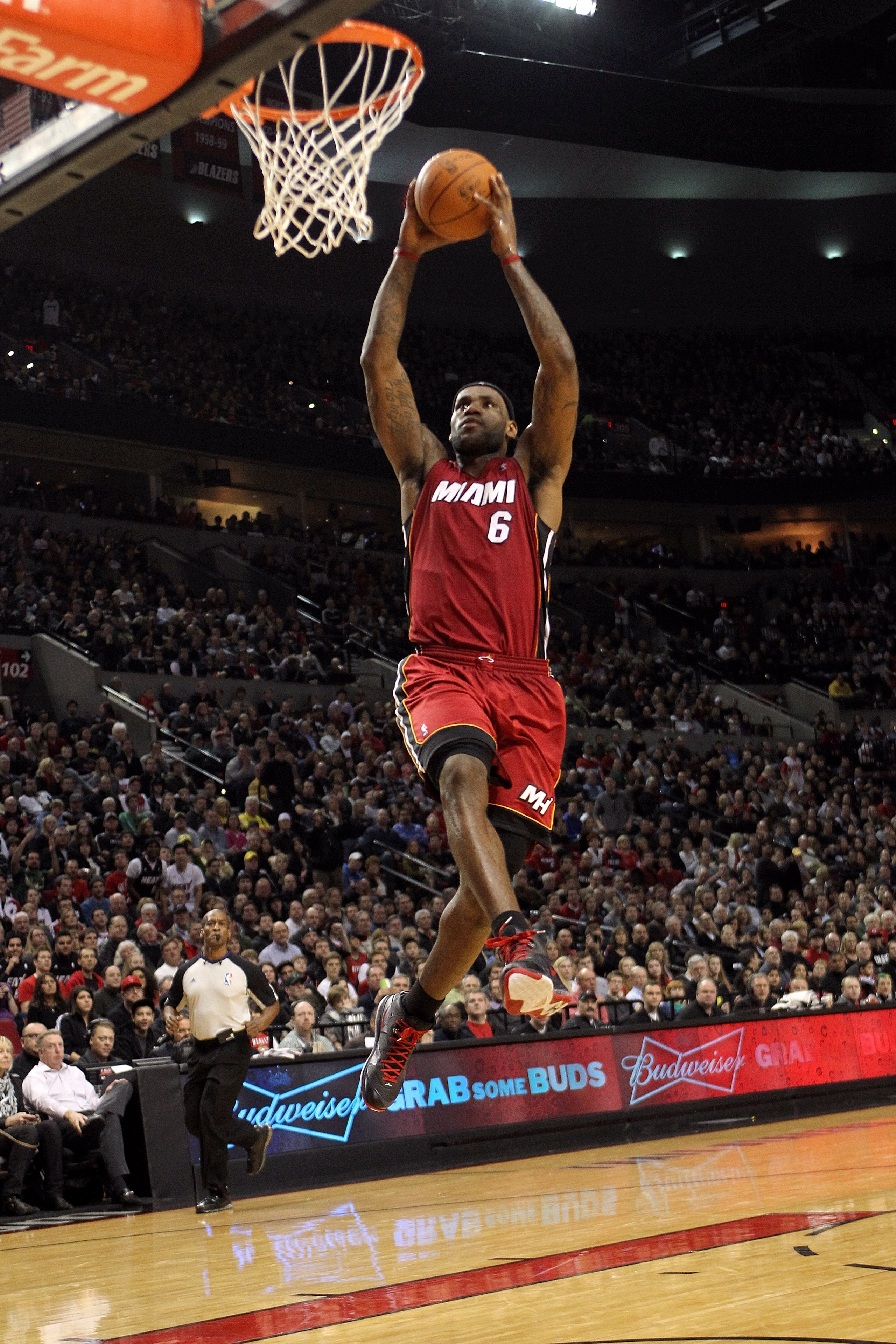 PORTLAND, OR - JANUARY 09: LeBron James #6 of the Miami Heat dunks against the Portland Trail Blazers during a game on January 9, 2011 at the Rose Garden Arena in Portland, Oregon. NOTE TO USER: User expressly acknowledges and agrees that, by downloading