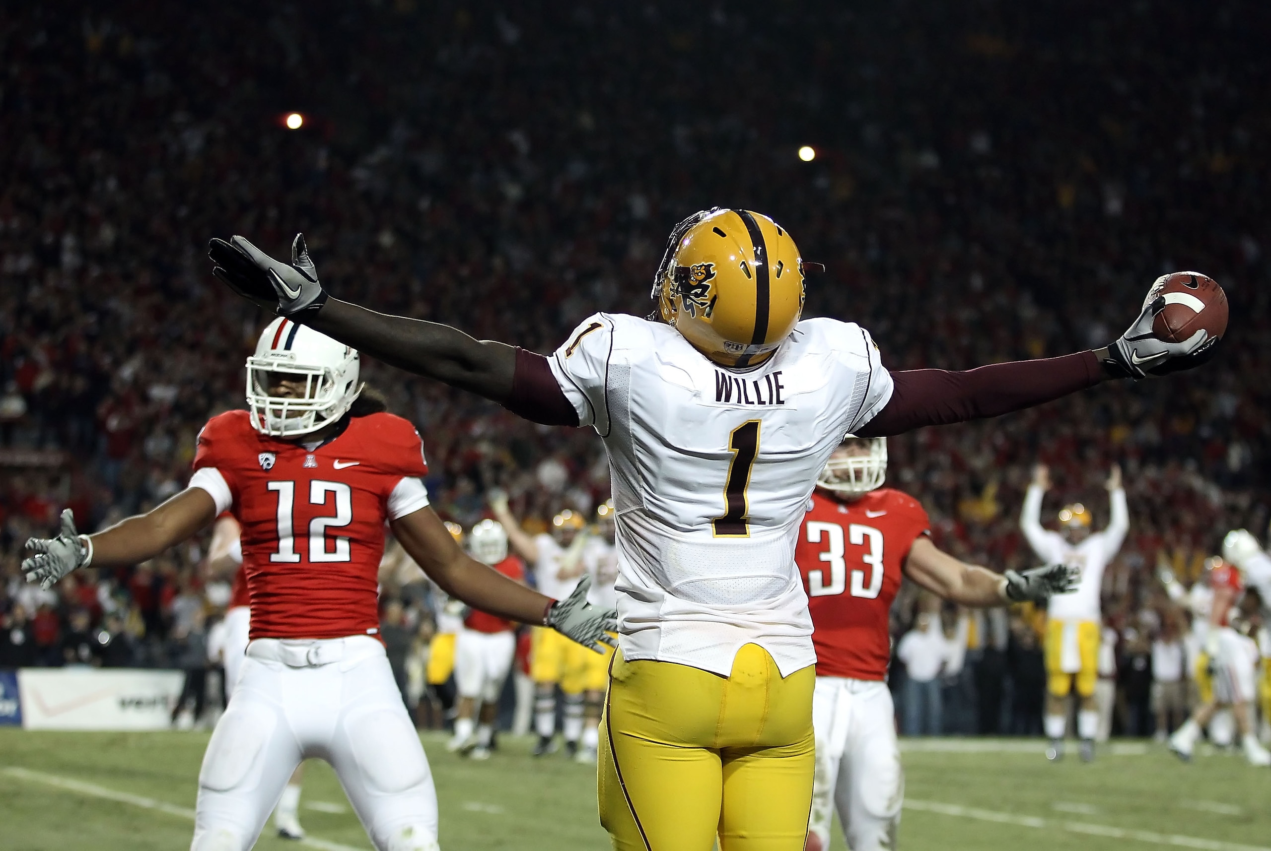 TUCSON, AZ - DECEMBER 02:  Wide receiver Mike Willie #1 of the Arizona State Sun Devils celebrates after scoring a touchdown reception during the college football game at Arizona Stadium on December 2, 2010 in Tucson, Arizona. The Sun Devils defeated the