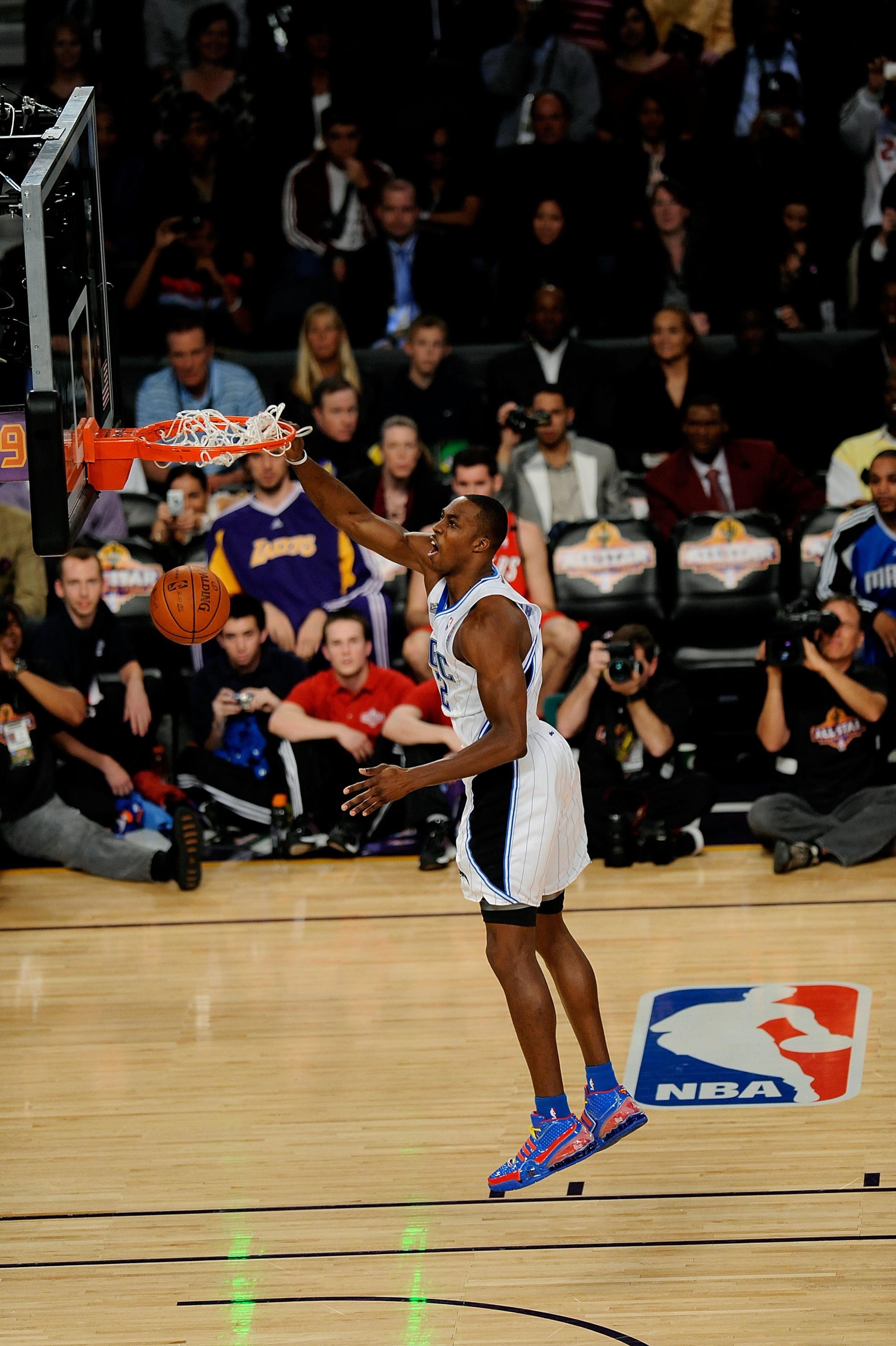 PHOENIX - FEBRUARY 14:  Dwight Howard of the Orlando Magic participates in the Sprite Slam Dunk Contest on All-Star Saturday Night, part of 2009 NBA All-Star Weekend at US Airways Center on February 14, 2009 in Phoenix, Arizona.  NOTE TO USER: User expres
