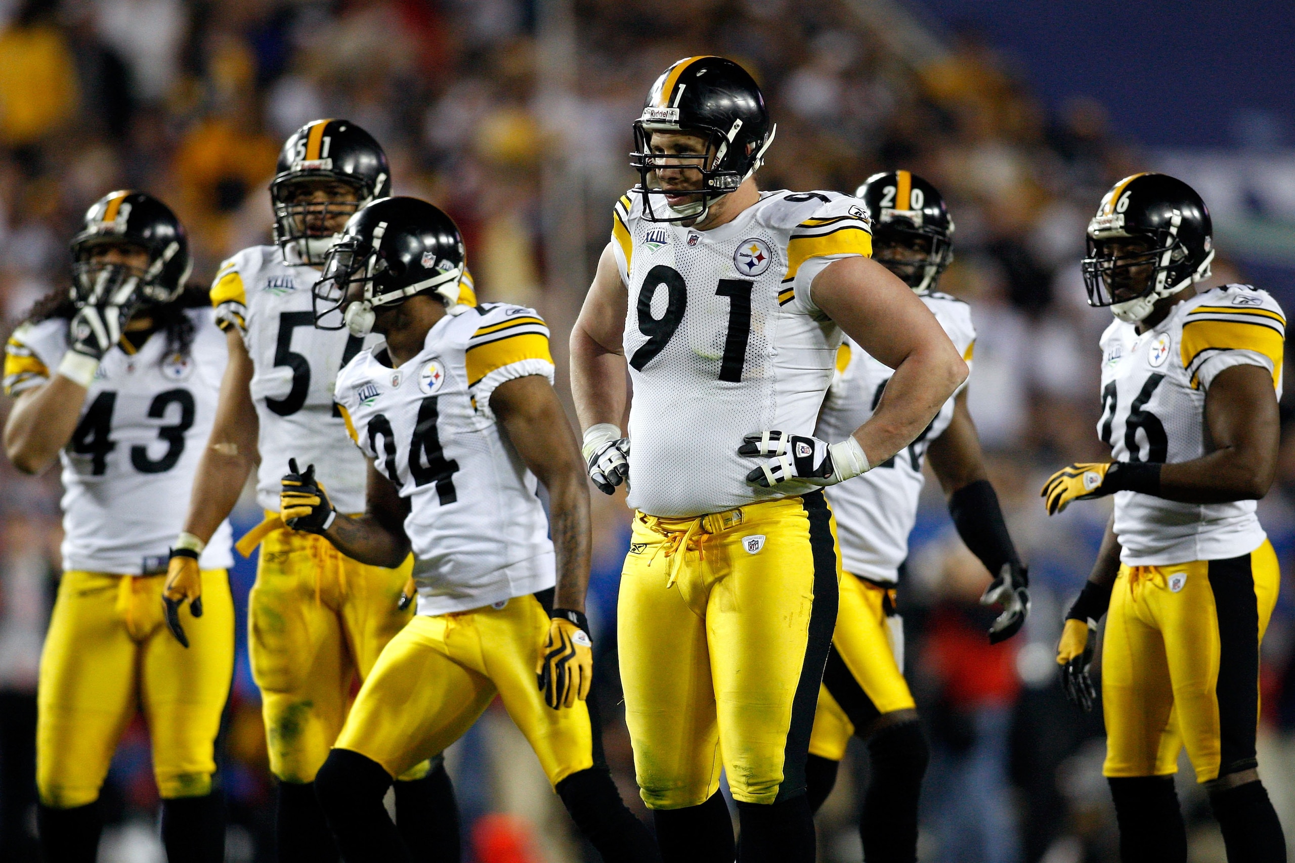 TAMPA, FL - FEBRUARY 01:  (L-R) Troy Polamalu #43, James Farrior #51, Ike Tayloer #24, Aaron Smith #91, Bryant McFadden #20 and Deshea Townsend #26 of the Pittsburgh Steelers get into position on defense against the Arizona Cardinals during Super Bowl XLI