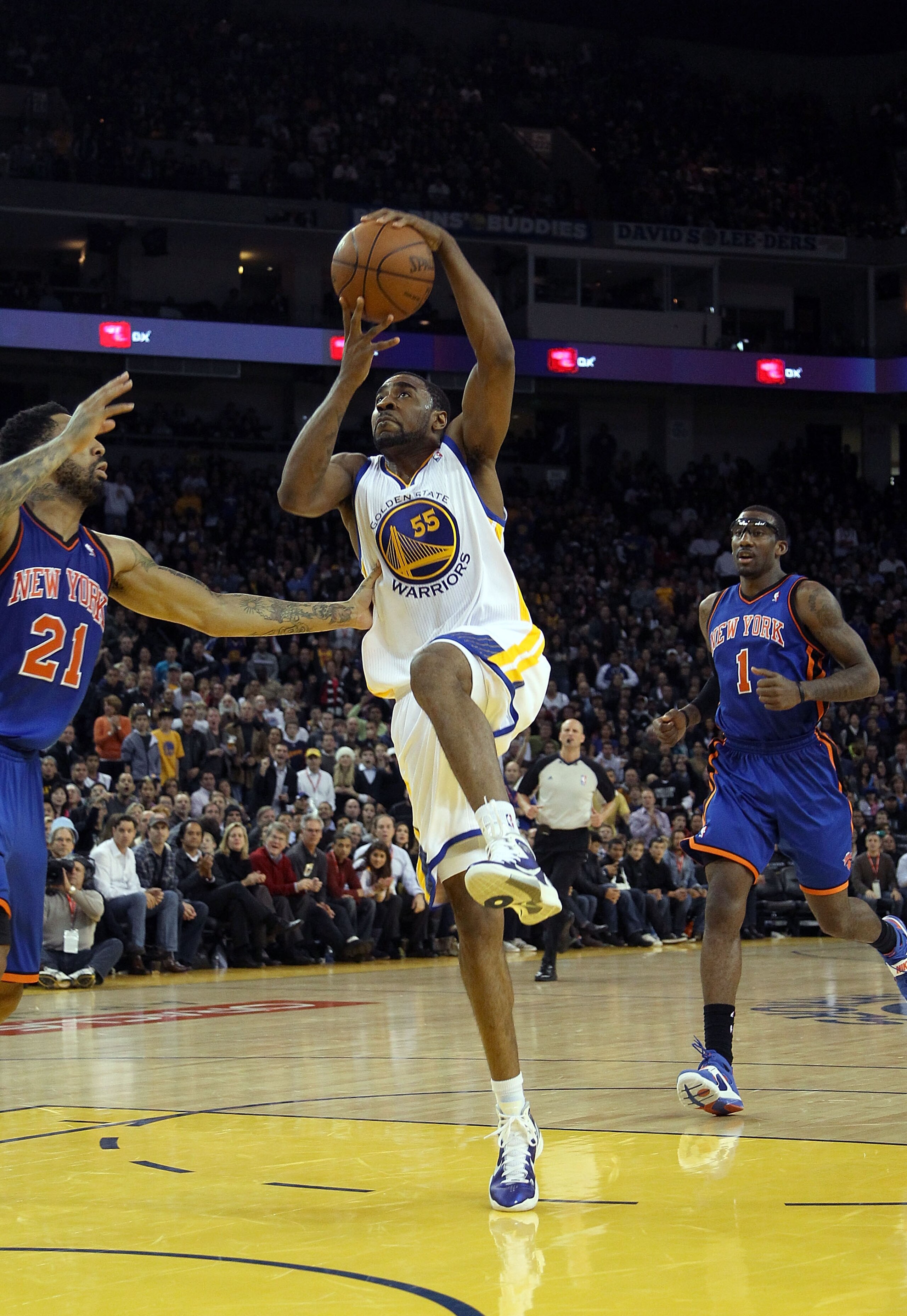 OAKLAND, CA - NOVEMBER 19: Reggie Williams #55 of the Golden State Warriors in action against the New York Knicks at Oracle Arena on November 19, 2010 in Oakland, California. NOTE TO USER: User expressly acknowledges and agrees that, by downloading and OAKLAND, CA - NOVEMBER 19: Reggie Williams #55 of the Golden State Warriors in action against the New York Knicks at Oracle Arena on November 19, 2010 in Oakland, California. NOTE TO USER: User expressly acknowledges and agrees that, by downloading and