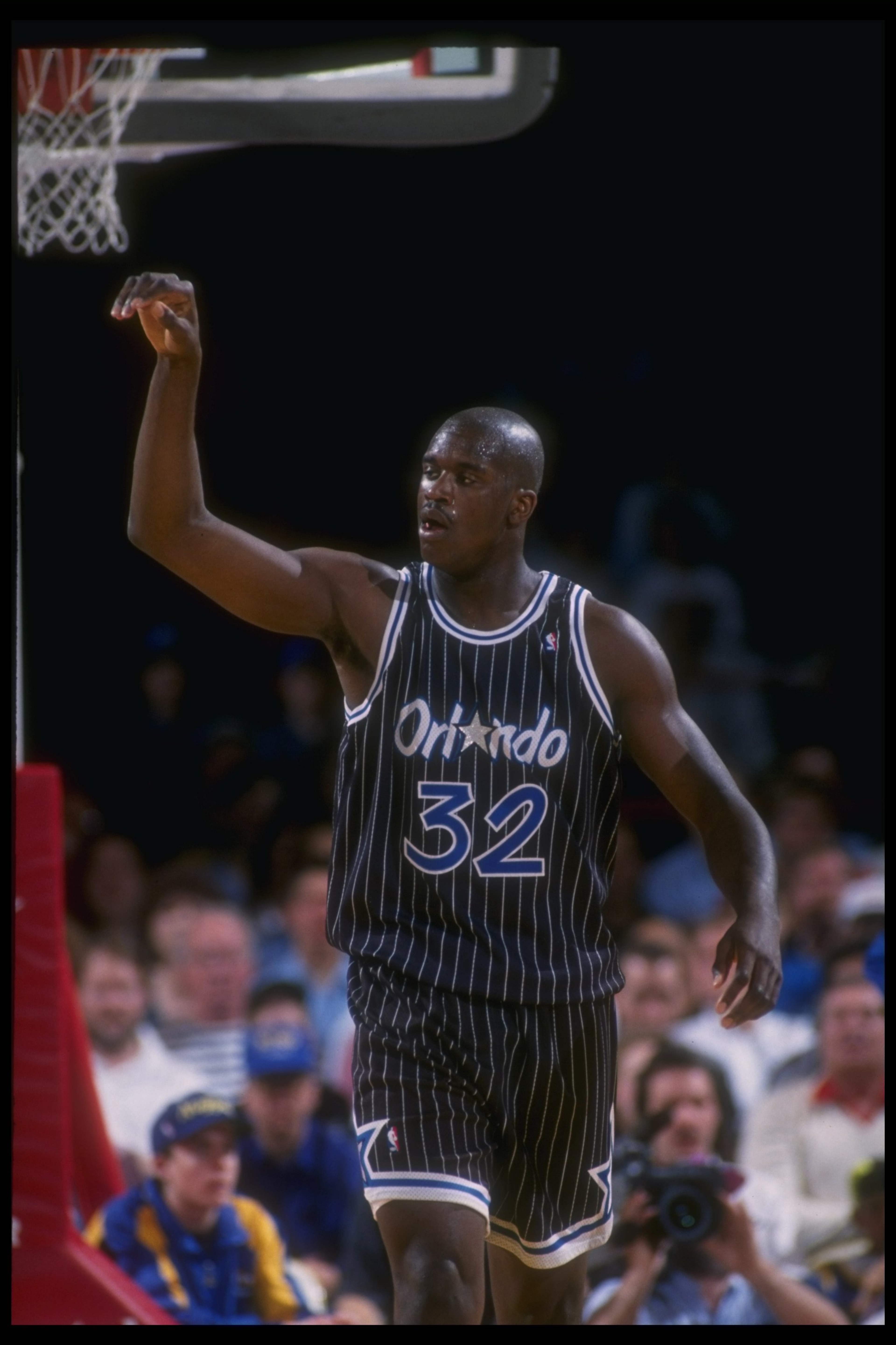 1992-1993:  Center Shaquille O''Neal of the Orlando Magic celebrates during a game against the Denver Nuggets at McNichols Arena in Denver, Colorado. Mandatory Credit: Tim DeFrisco  /Allsport Mandatory Credit: Tim DeFrisco  /Allsport