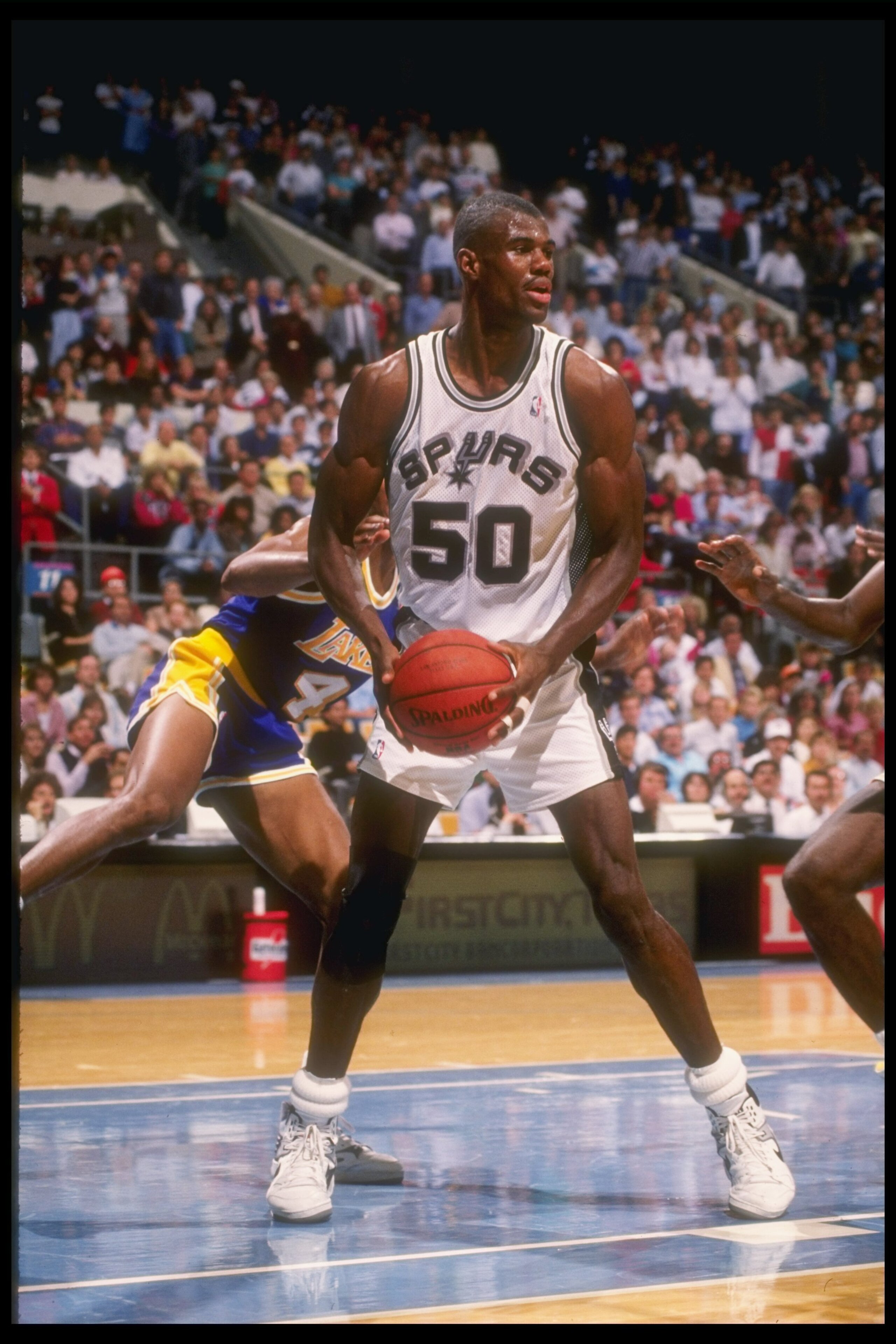 1989-1990:  Center David Robinson of the San Antonio Spurs looks to pass the ball during a game. Mandatory Credit: Allsport  /Allsport Mandatory Credit: Allsport  /Allsport