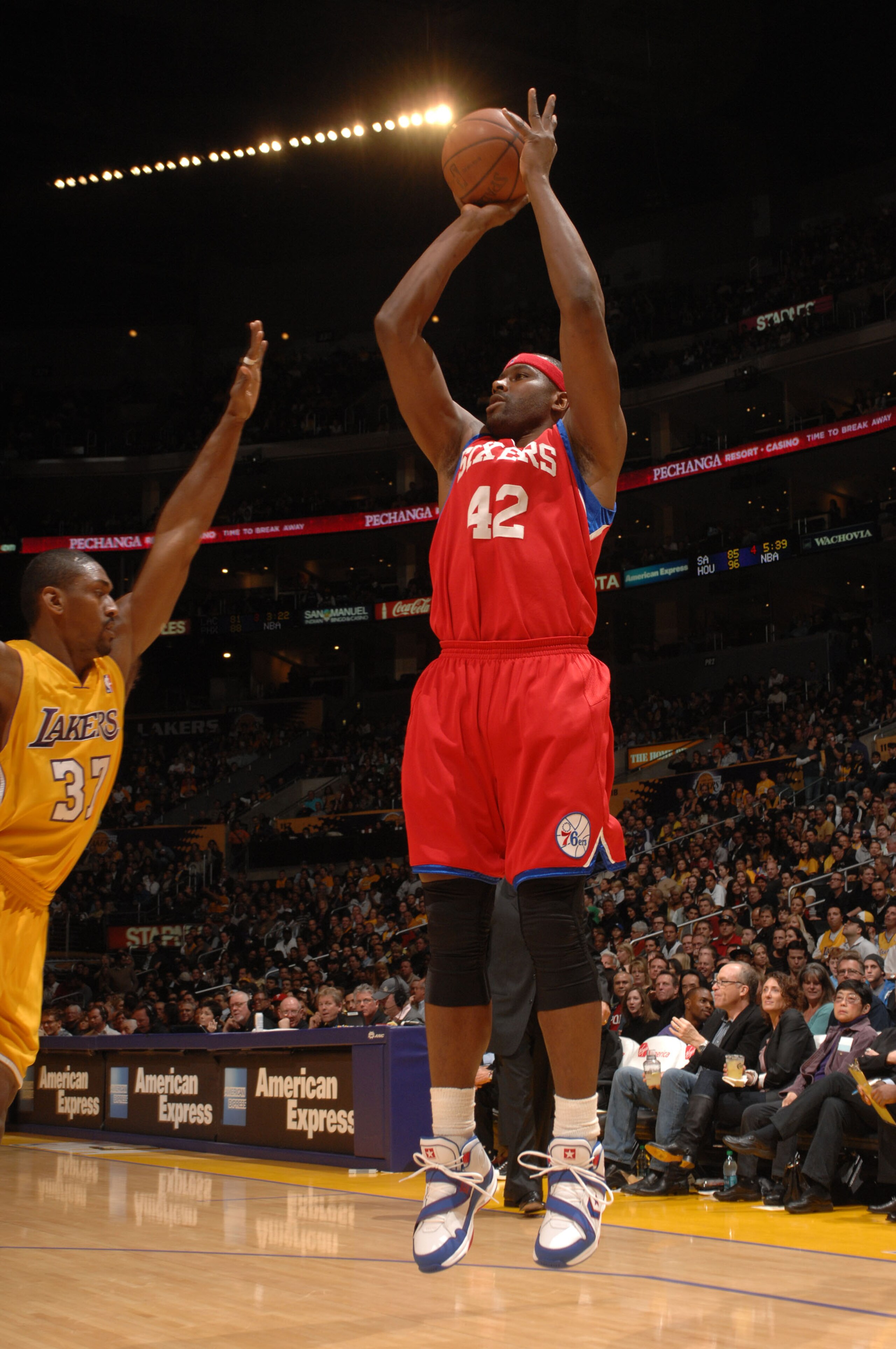 LOS ANGELES - FEBRUARY 26:  Elton Brand #42 of the Philadelphia 76ers shoots against Ron Artest #37 of the Los Angeles Lakers at Staples Center on February 26, 2010 in Los Angeles, California. NOTE TO USER: User expressly acknowledges and agrees that, by