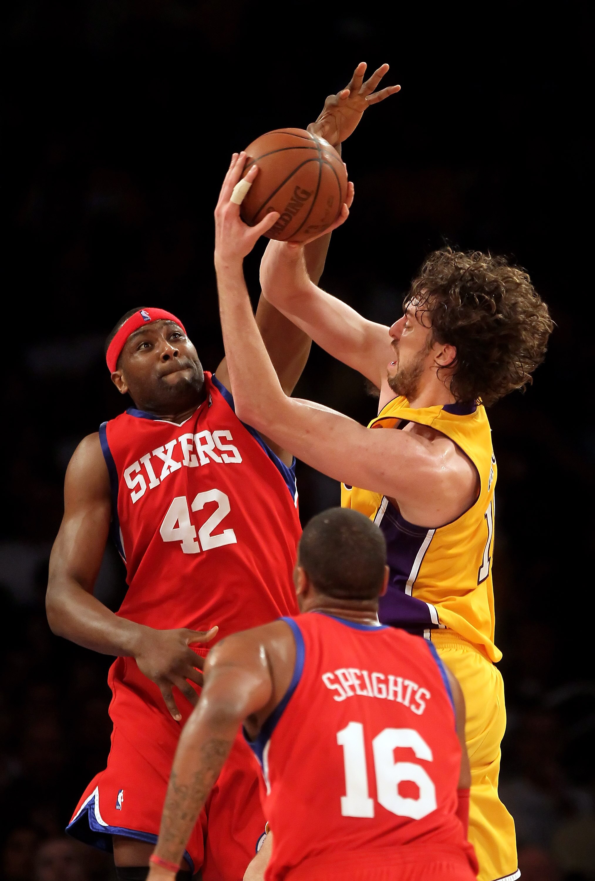 LOS ANGELES, CA - FEBRUARY 26:  Pau Gasol #16 of the Los Angeles Lakers is defended by Elton Brand #42 of the Philadelphia 76ers in the first half at Staples Center on February 26, 2010 in Los Angeles, California. NOTE TO USER: User expressly acknowledges