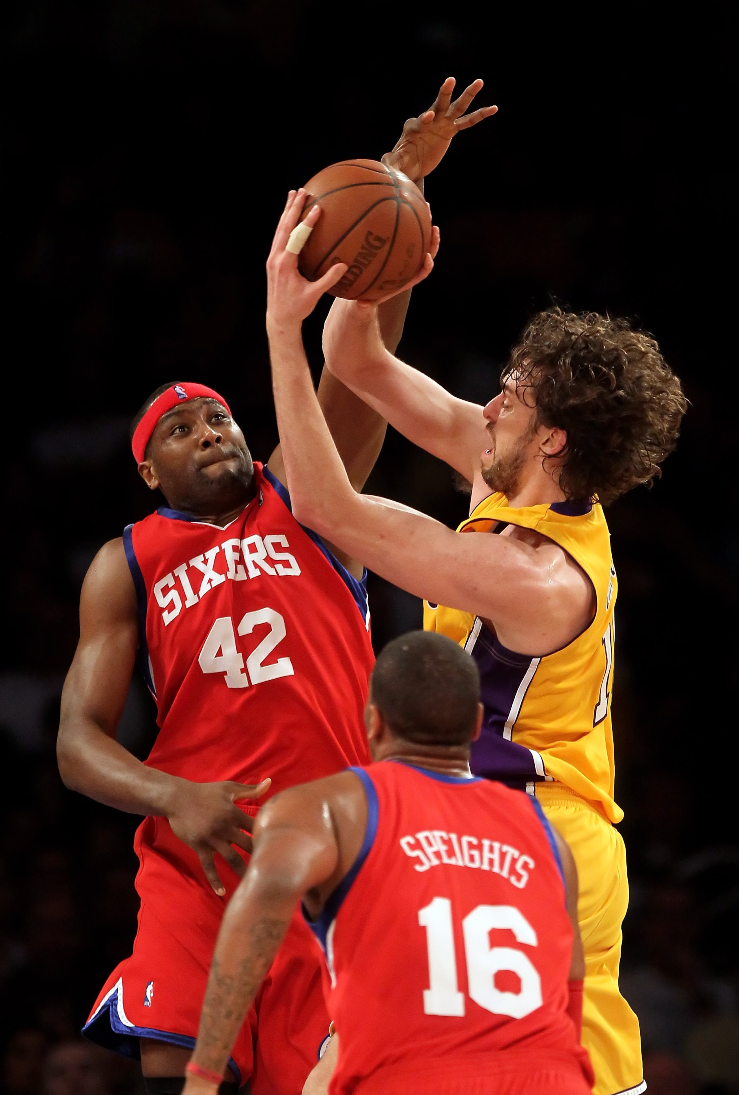 LOS ANGELES, CA - FEBRUARY 26:  Pau Gasol #16 of the Los Angeles Lakers is defended by Elton Brand #42 of the Philadelphia 76ers in the first half at Staples Center on February 26, 2010 in Los Angeles, California. NOTE TO USER: User expressly acknowledges