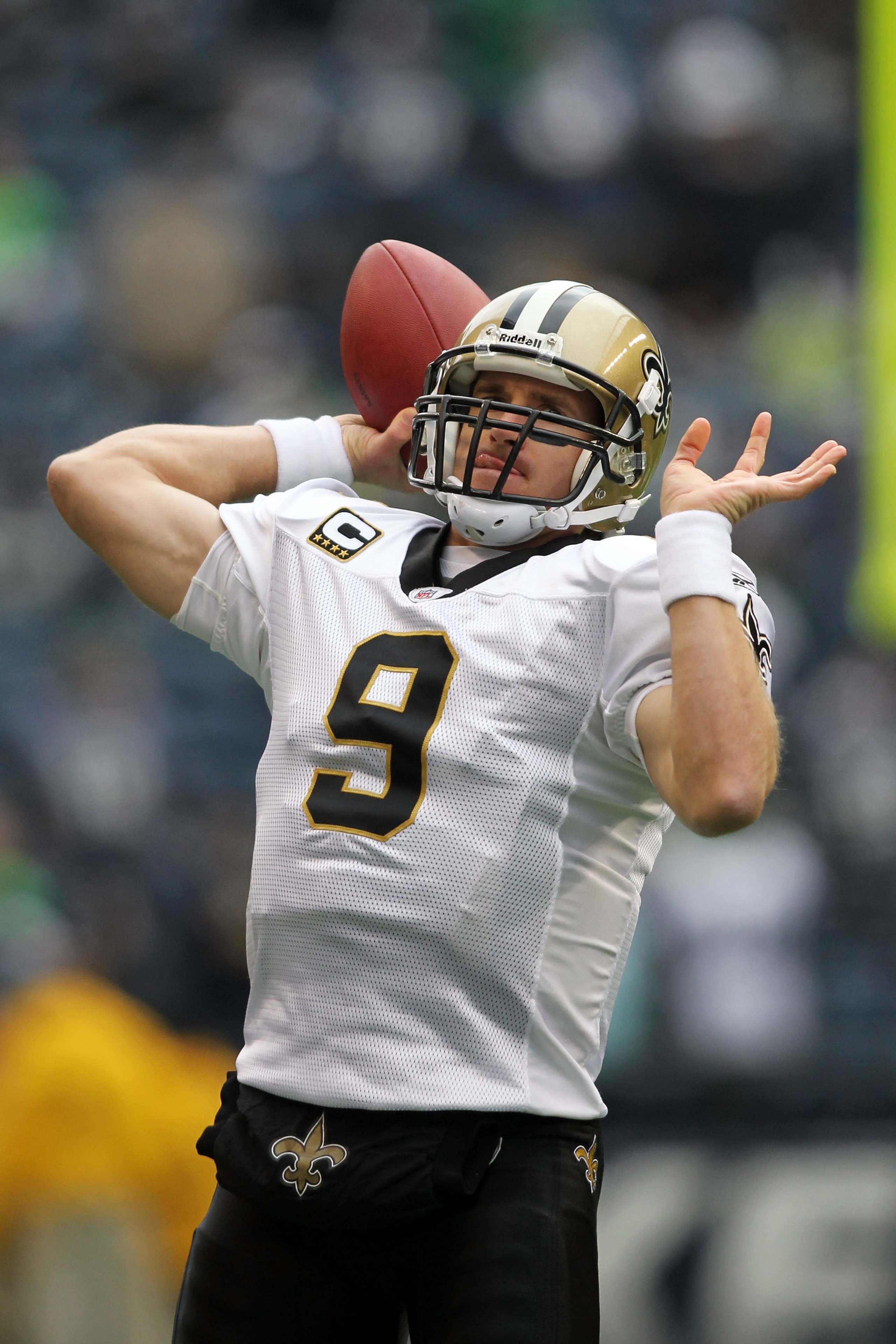 SEATTLE, WA - JANUARY 08:  Quarterback Drew Brees #9 of the New Orleans Saints throws the ball against the Seattle Seahawks during the 2011 NFC wild-card playoff game at Qwest Field on January 8, 2011 in Seattle, Washington.  (Photo by Jonathan Ferrey/Get
