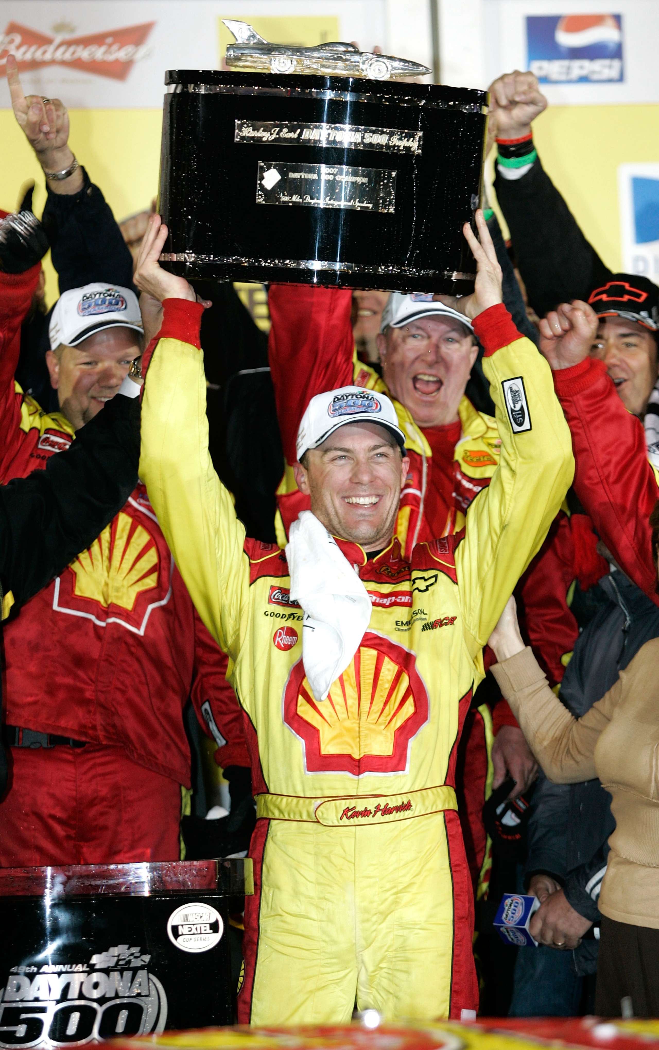 DAYTONA, FL - FEBRUARY 18:  Kevin Harvick, driver of the #29 Shell/Pennzoil Chevrolet, celebrates in victory lane with the winners trophy, after winning the NASCAR Nextel Cup Series Daytona 500 at Daytona International Speedway on February 18, 2007 in Day