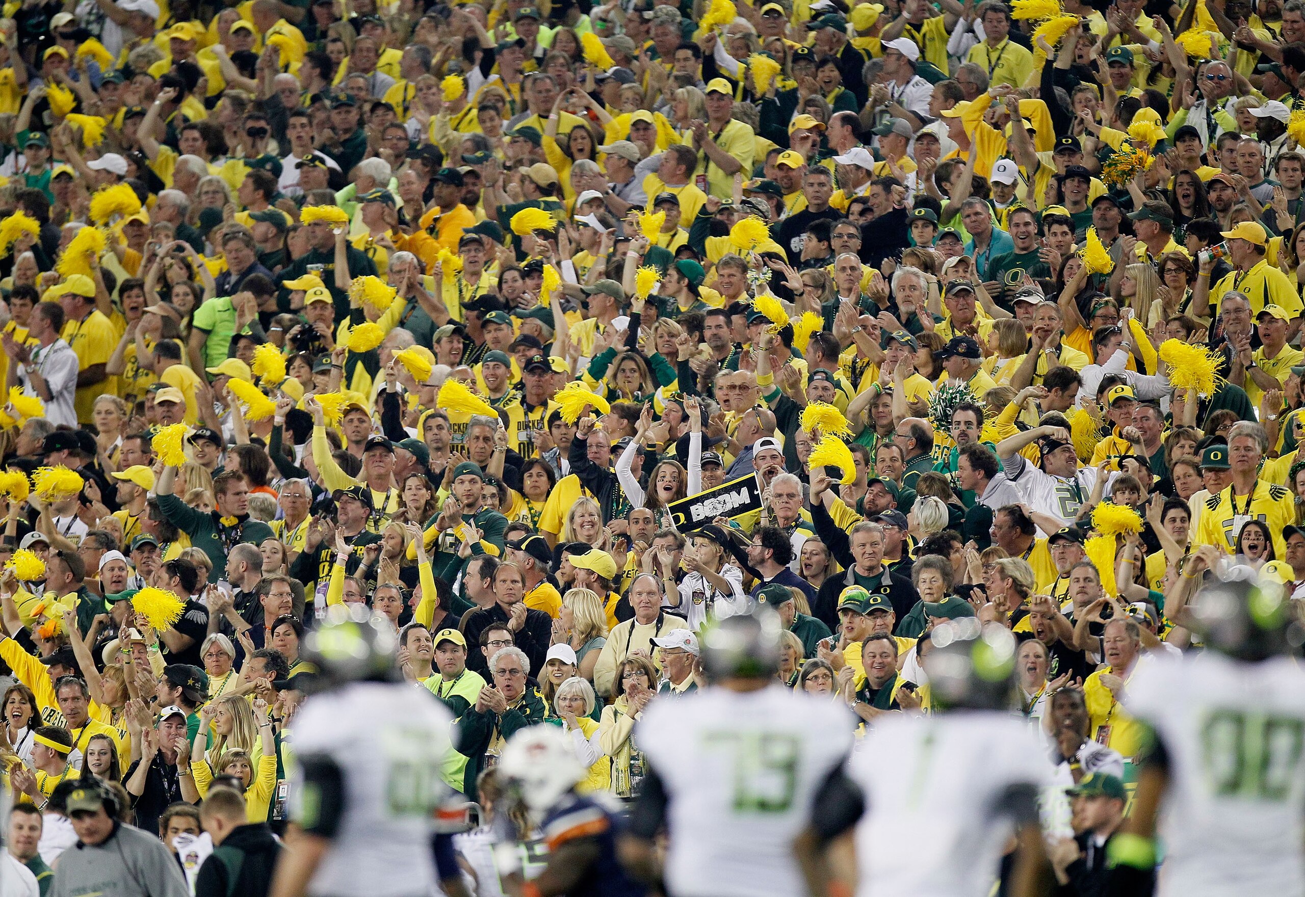 GLENDALE, AZ - JANUARY 10:  Oregon Ducks fans attend their Tostitos BCS National Championship Game against the Auburn Tigers at University of Phoenix Stadium on January 10, 2011 in Glendale, Arizona.  (Photo by Kevin C. Cox/Getty Images)