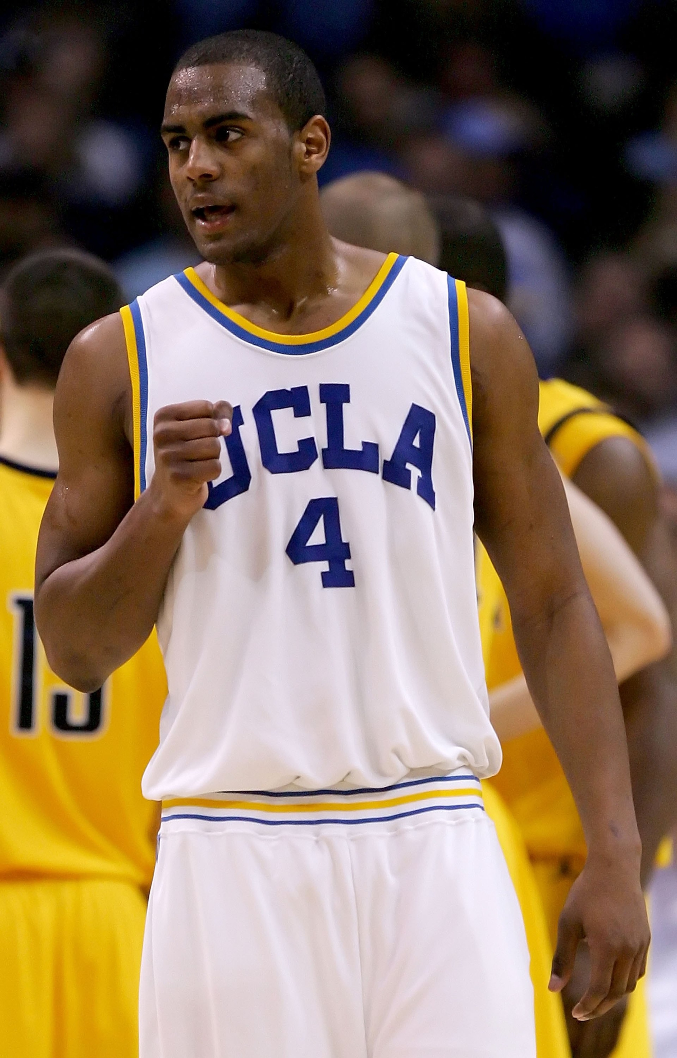 LOS ANGELES, CA - MARCH 11:  Arron Aflalo #4 of the UCLA Bruins celebrates in the second half of the game against the California Golden Bears during the championship final of the 2006 Pacific Life Pac-10 Men's Basketball Tournament on March 11, 2006 at St